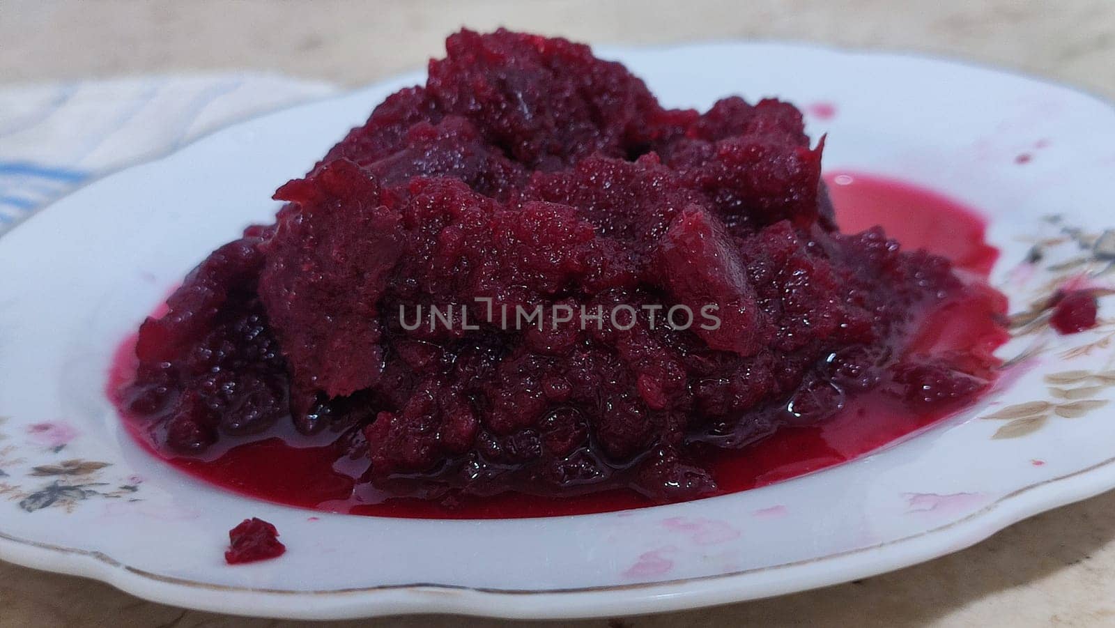 red boiled beets grated on a plate, vegetables food. High quality photo