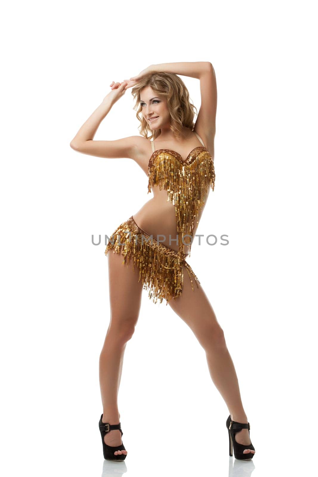 Coquettish fair-haired woman dancing in studio by rivertime
