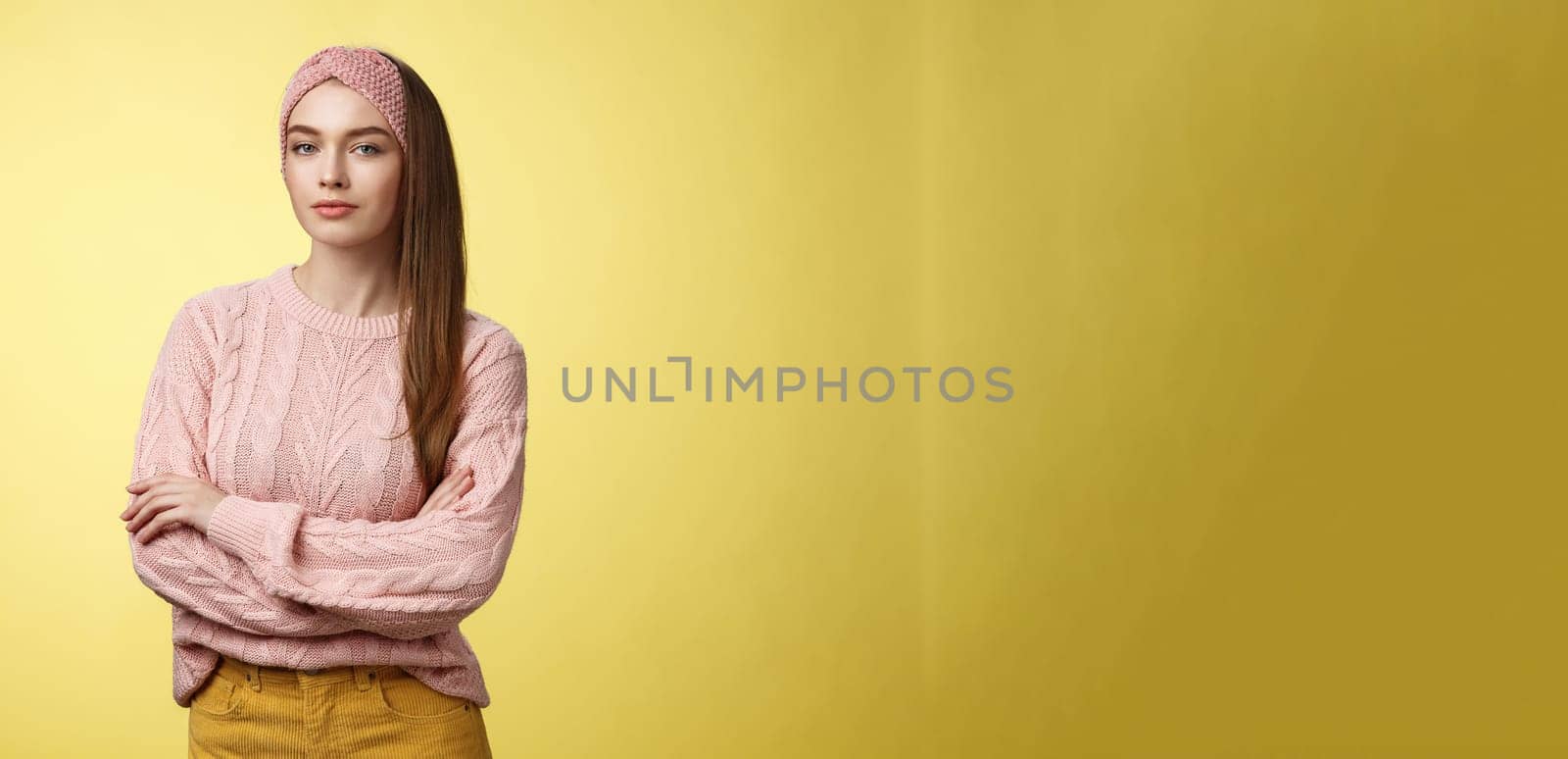 Try me. Confident glamour young female beauty salon manager cross hands over chest looking confident and sassy with self-assured smirk. Girl student posing against yellow background encouraged by Benzoix