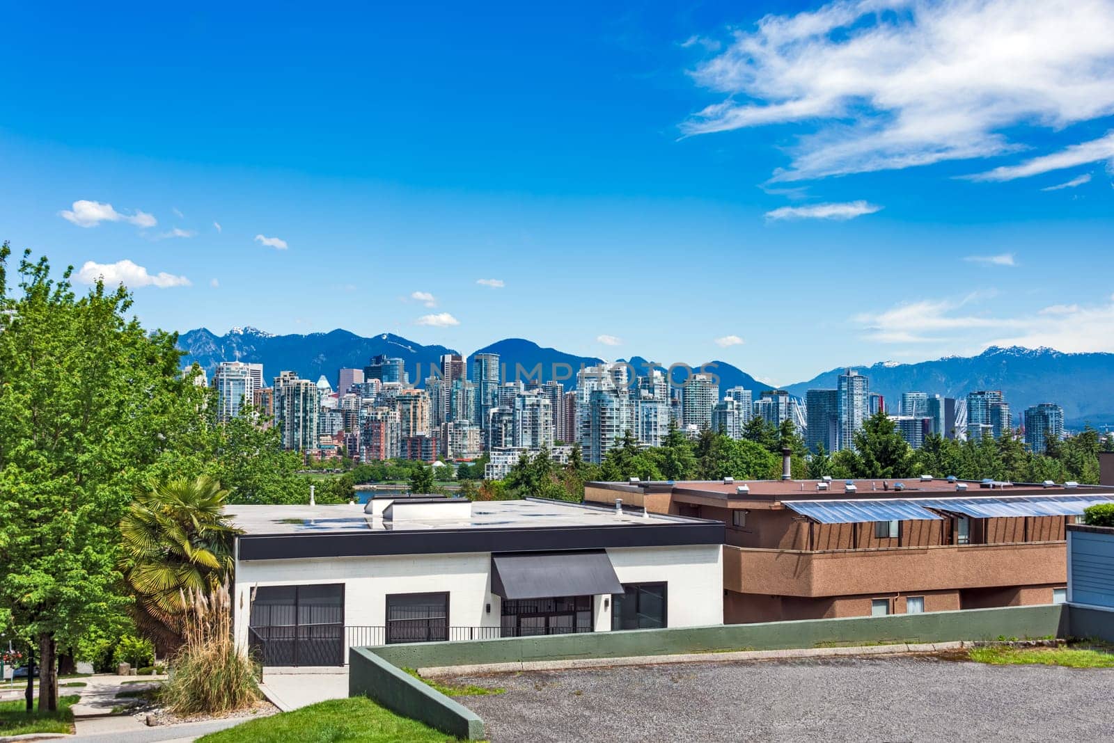 View over high-rise buildings in downtown from residential area in Vancouver, Canada.