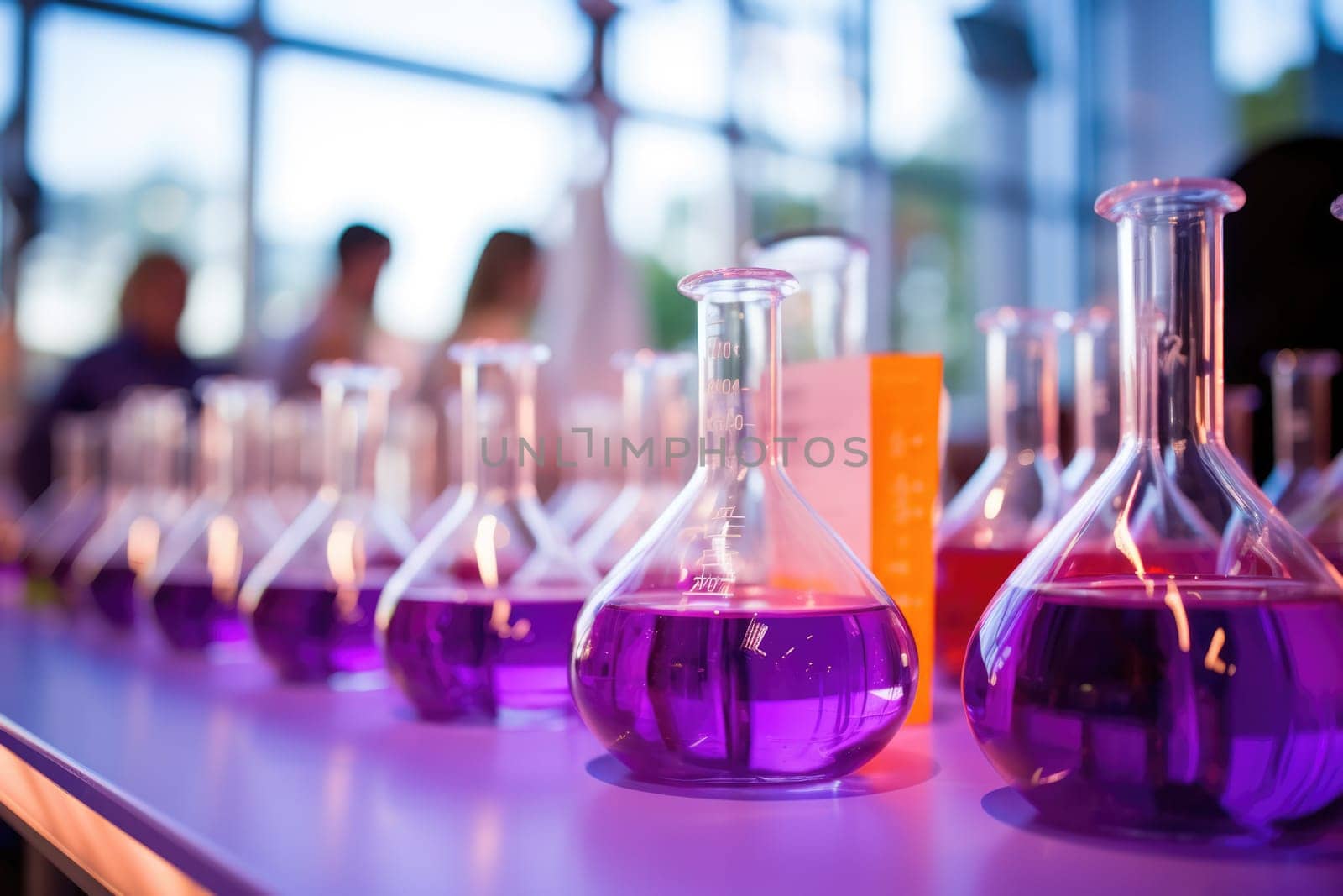 Bright colourful image of a variety of glass objects of different shapes and structures in neon colours. Background and texture. Light and colour.