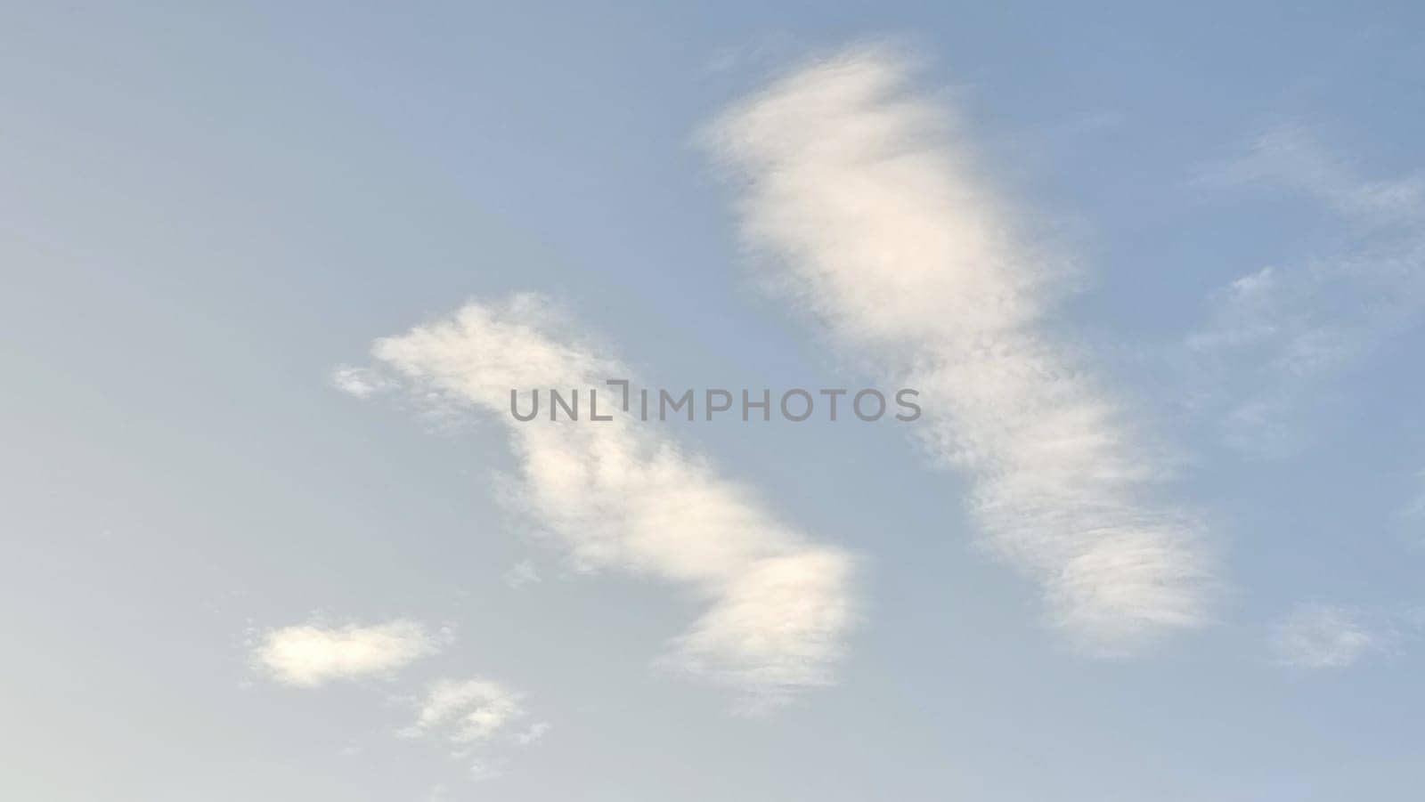 Blue light sky nature white clouds whether background . High quality photo