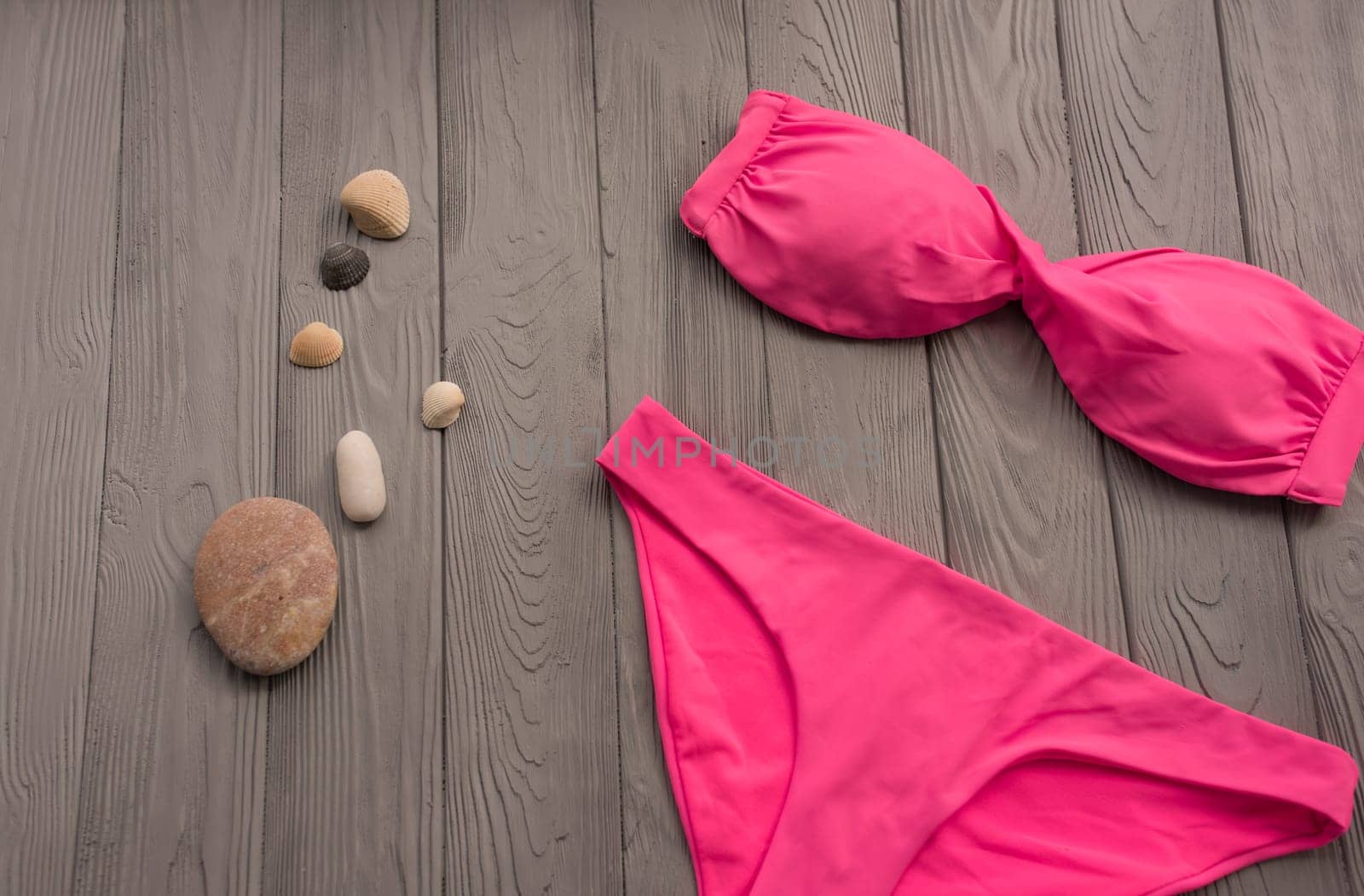 woman trending two-piece swimsuit beach pink swimwear fashion sunglasses. Summer background by AndriiDrachuk