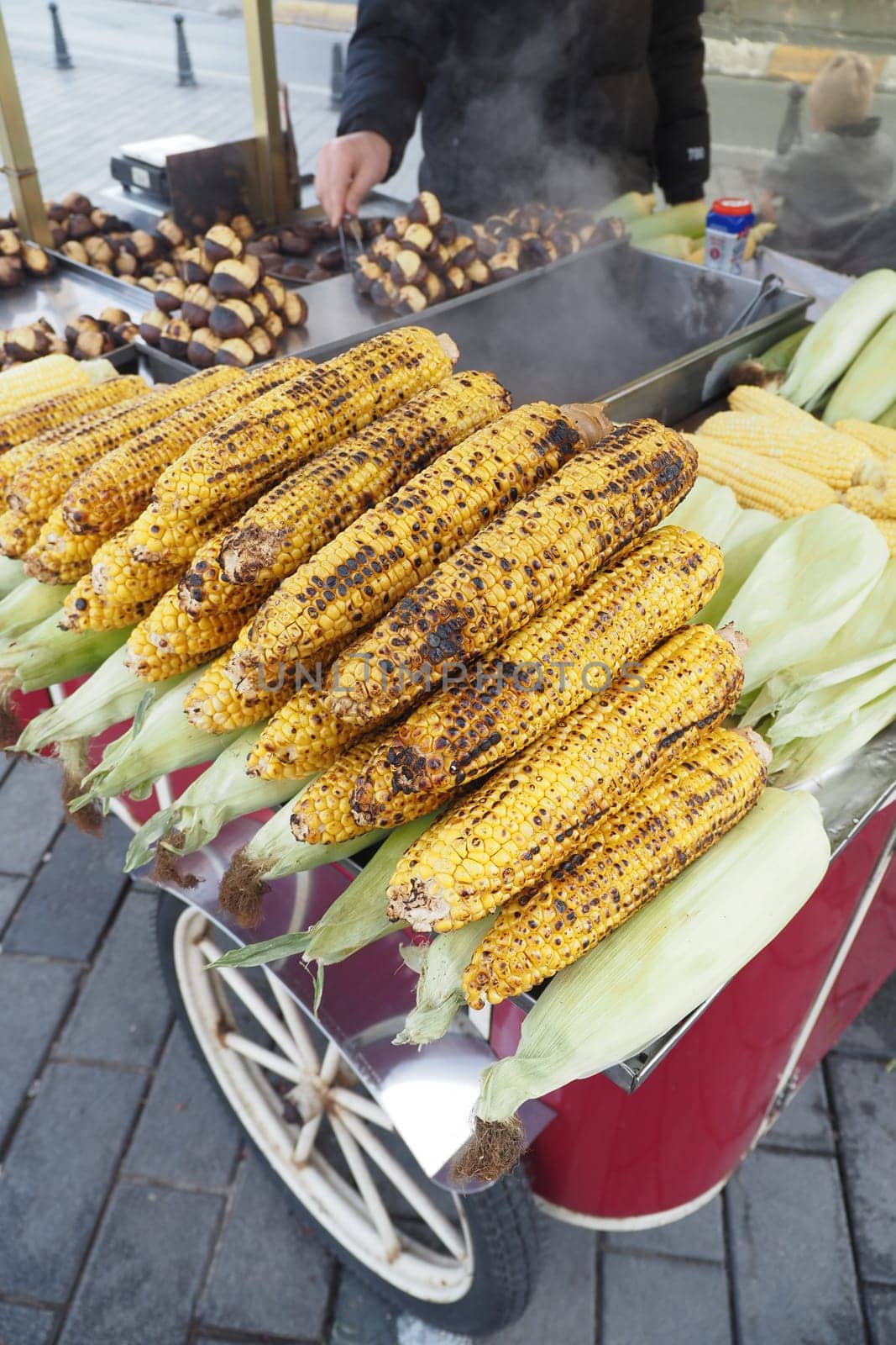 Yellow corn is baked or roasted on charcoal. Street food istanbul .