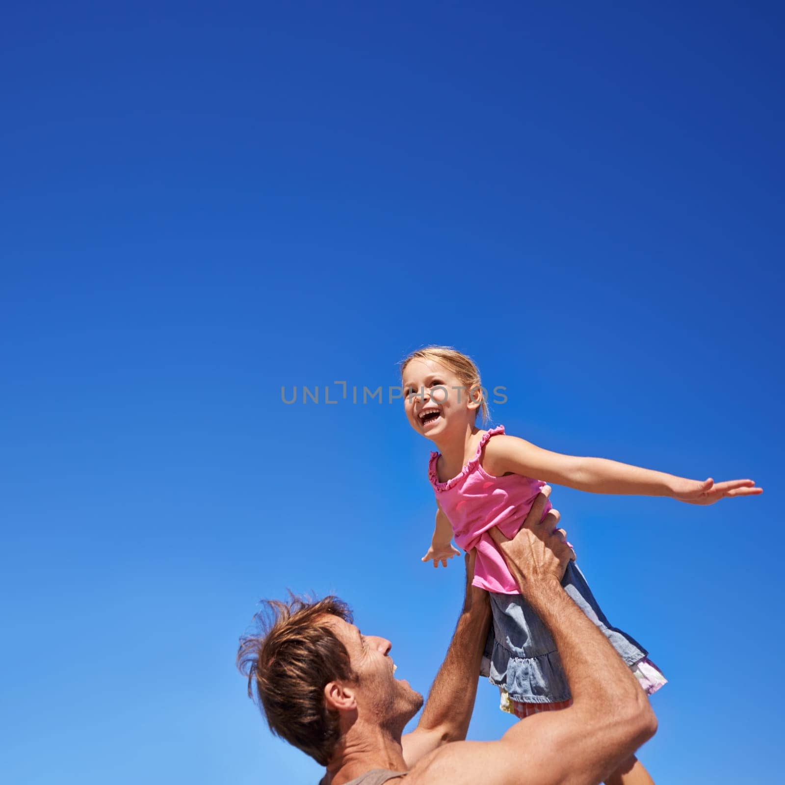 Fly, father and girl with fun, playing and happiness with family, sky background and smile. Outdoor, nature and dad carrying daughter with wellness and weekend break with summer, freedom and energy.