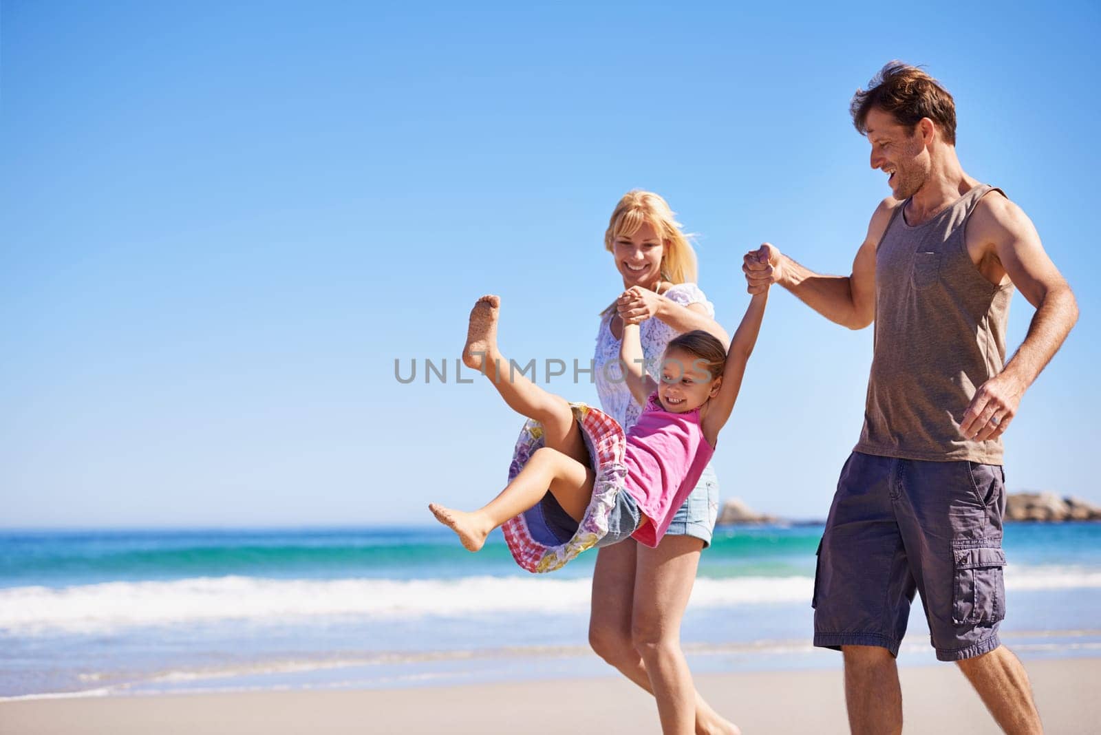 Family, child and bonding by swinging on beach, love and trust or having fun on summer holiday. Happy parents, daughter and playing game on tropical vacation, outdoors and smile on mockup space.