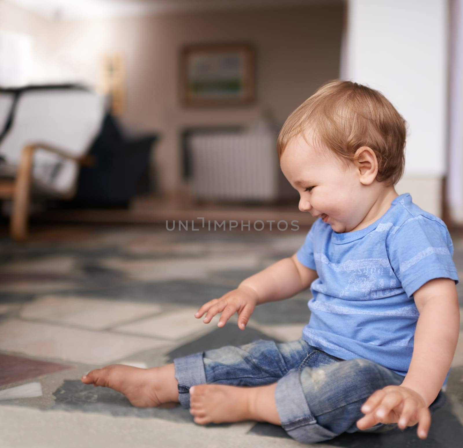Growth, development and childhood for toddler in lounge for play and curiosity on floor. Baby, infant or kid at home with smiles and sitting with laugh and happiness for adorable and indoors by YuriArcurs