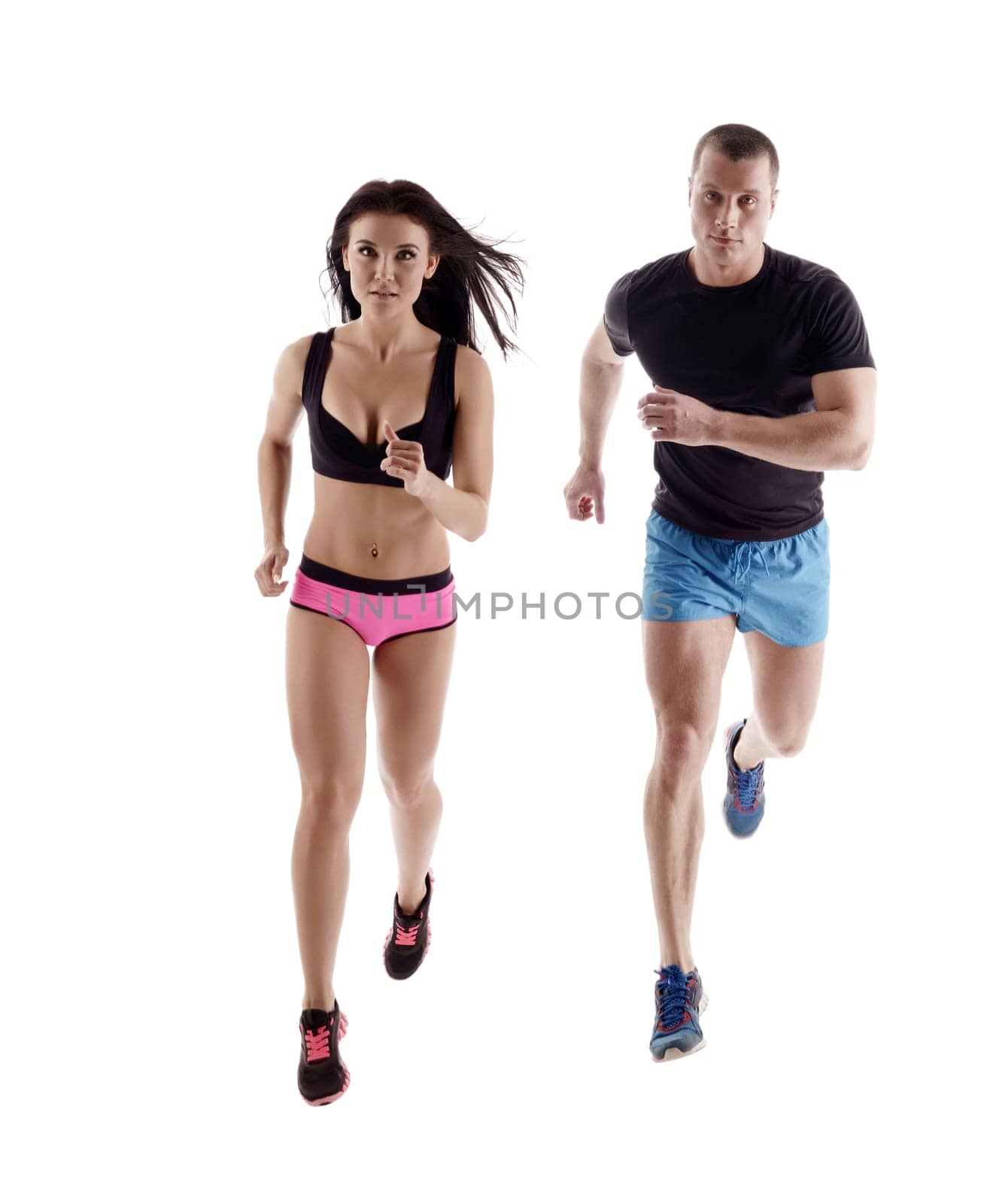 Studio photo of handsome runners posing at camera, isolated on white