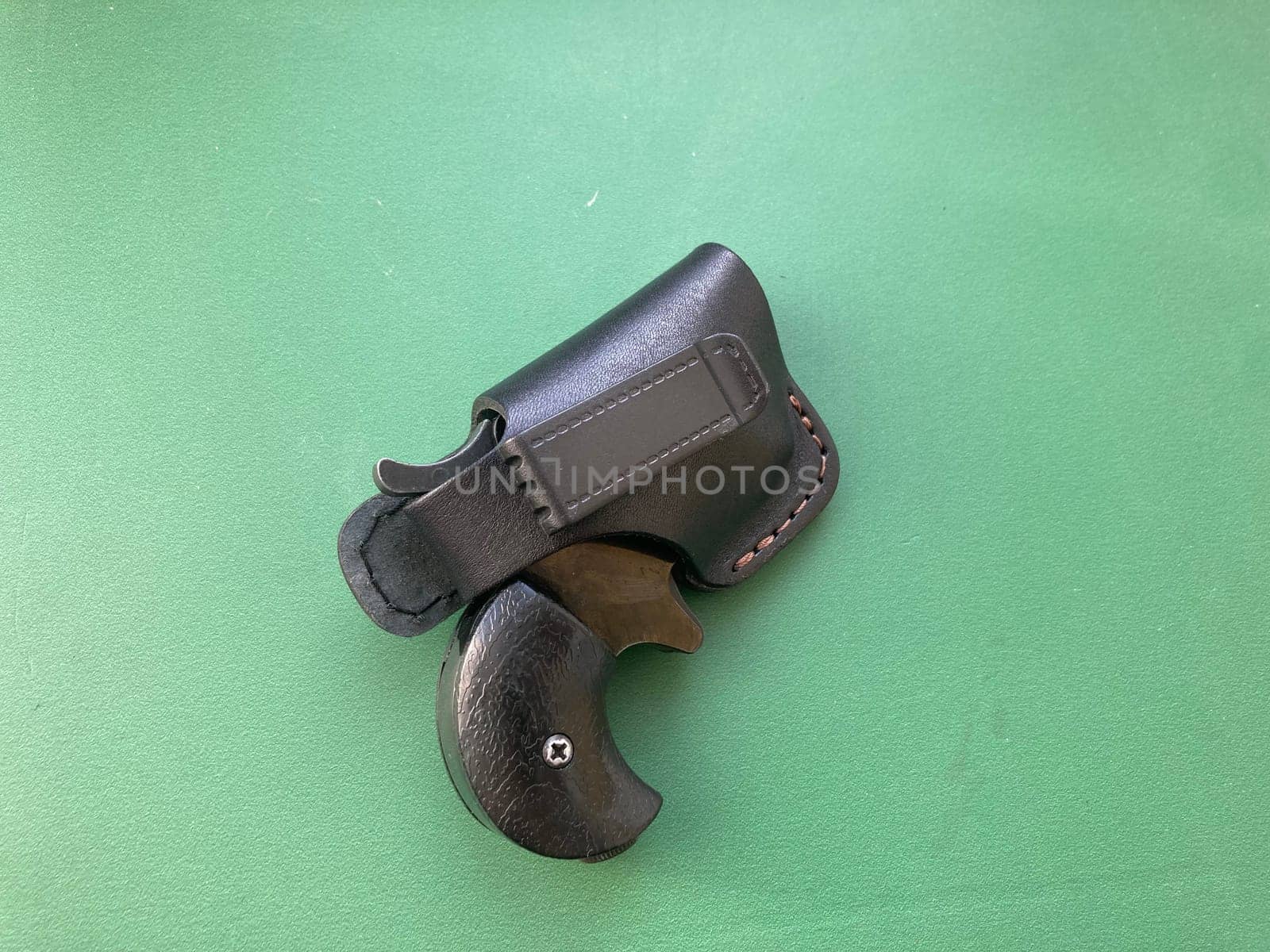 Revolver with holster for concealed carry of the weapons