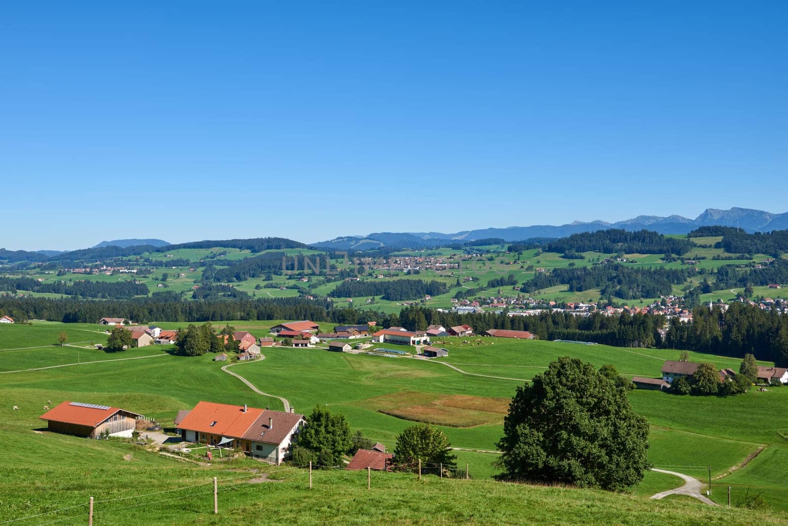 Alpine Foothills Charm: Rural Mountainside Living with Farmer's Homesteads. Mountain Countryside: Farmer's Dwellings, Pastures, and the Sky Above. Nature's Eco-Friendly Living in the Alpine Highlands. Rural Elegance: Alpine Homesteads, Pastures, and the Skies of Conservation. Alpine Horizon: Farmers' Dwellings, Green Pastures, and Environmental Harmony by Andrii_Ko