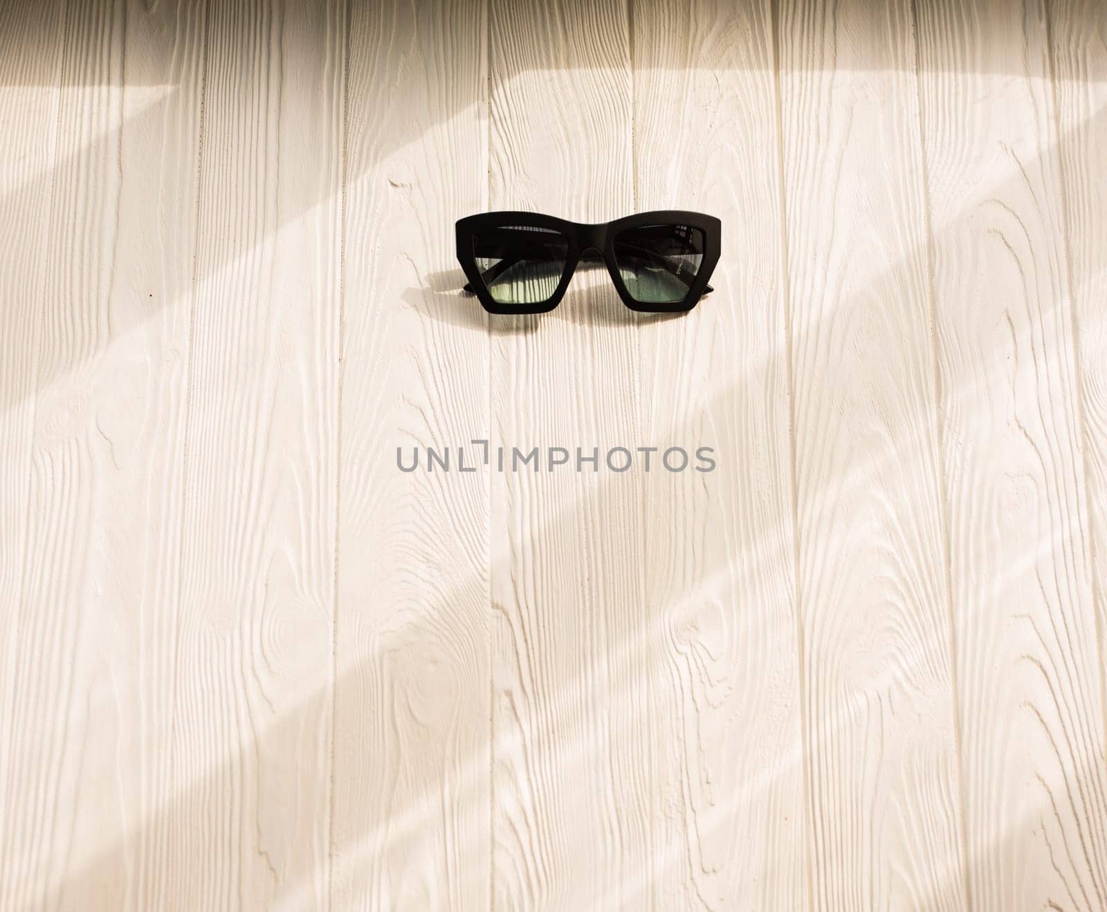 Stylish black sunglasses. Summer background mockup template text by AndriiDrachuk