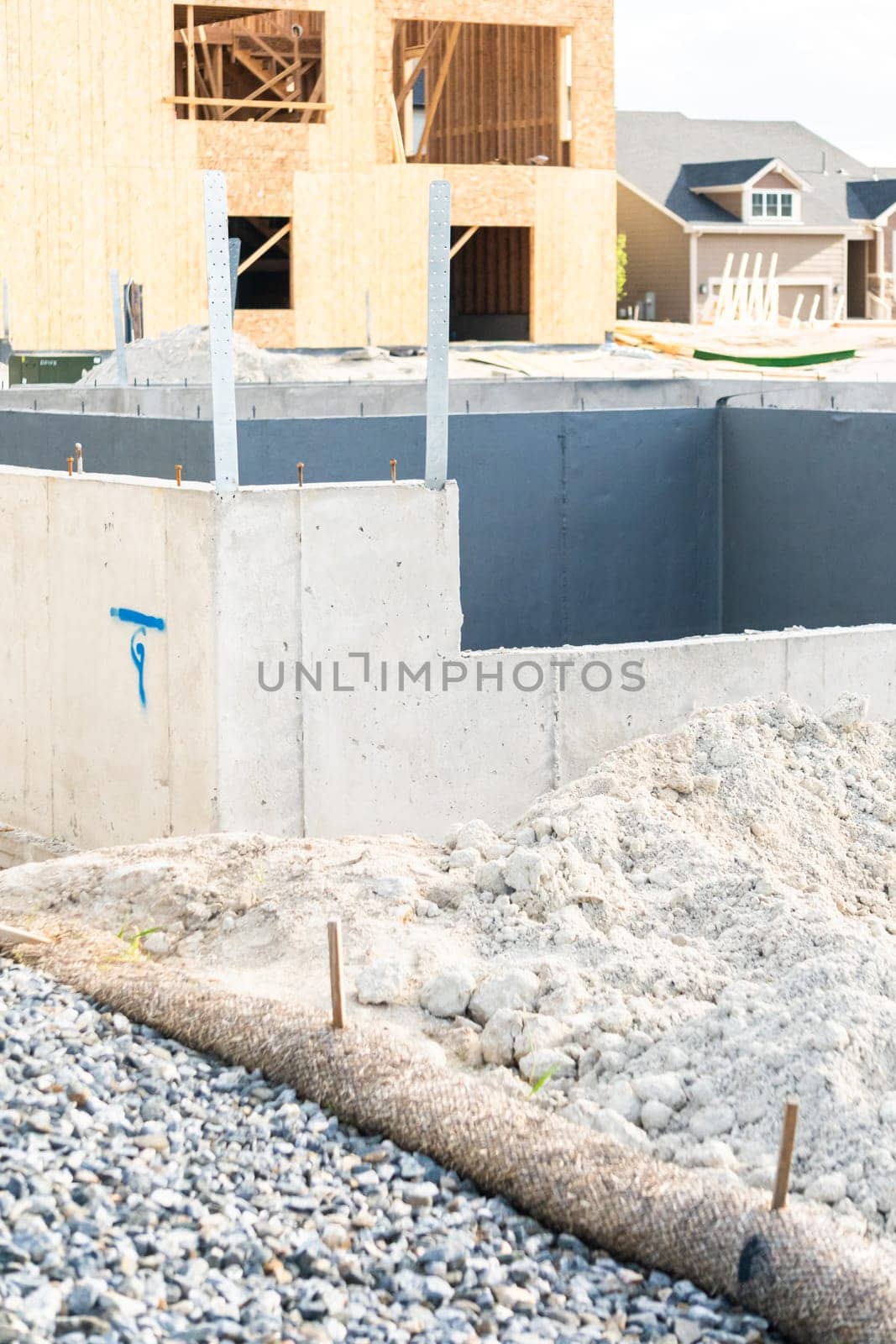 Suburban Single-Family House Construction: Foundation Stage Progress by arinahabich