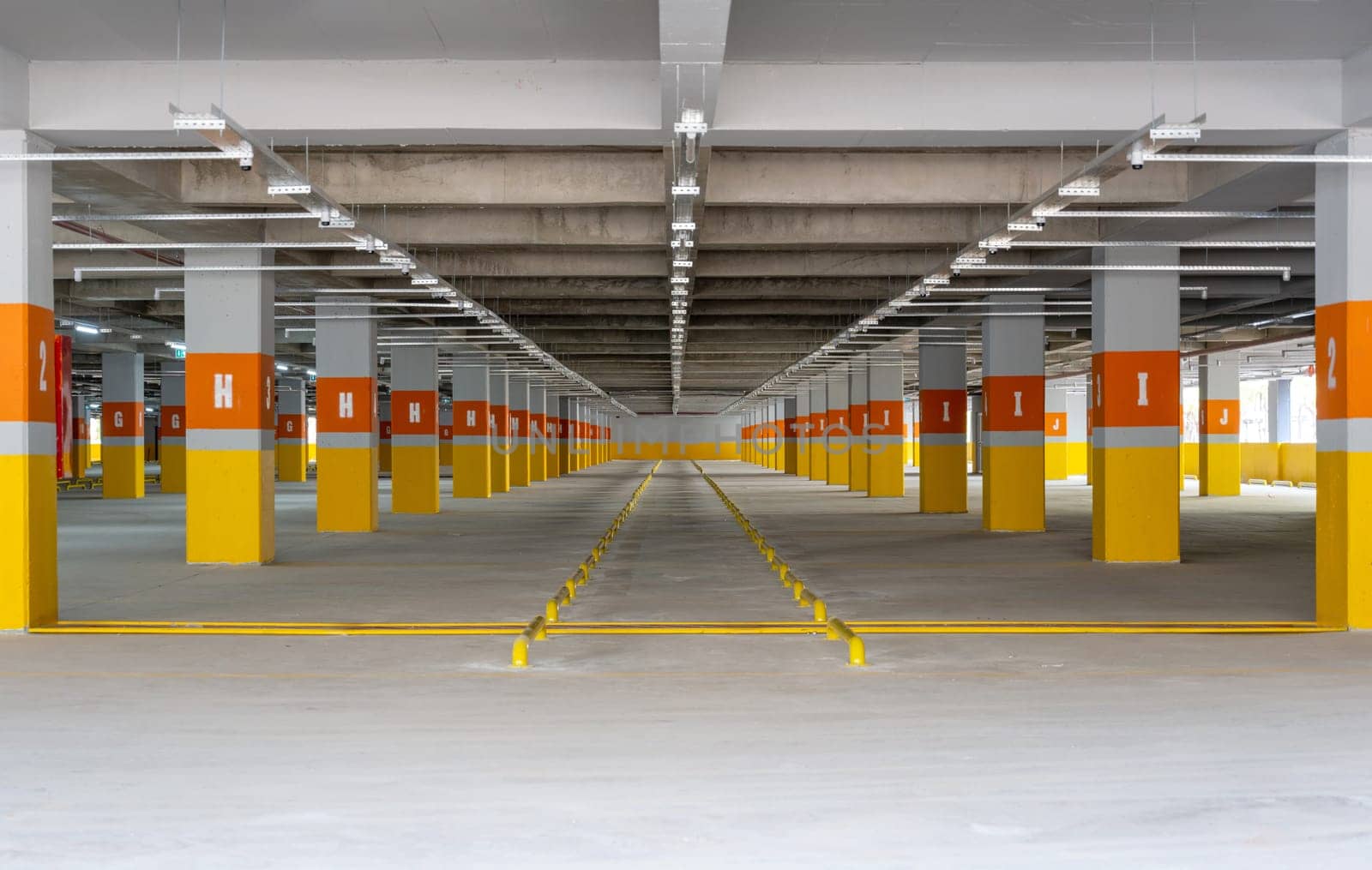 Newly built empty parking garage of the shopping center by Sonat