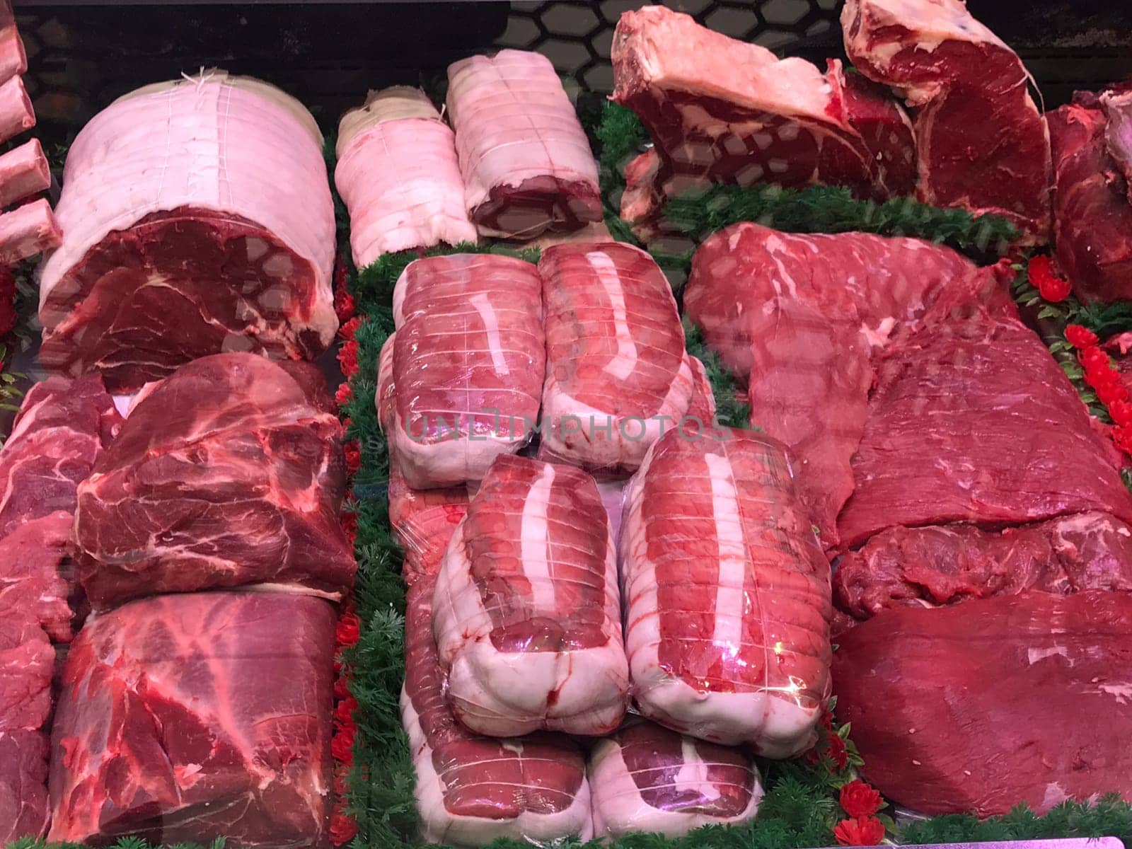Showcase with raw meat in butcher shop, Supermarket, High quality photo