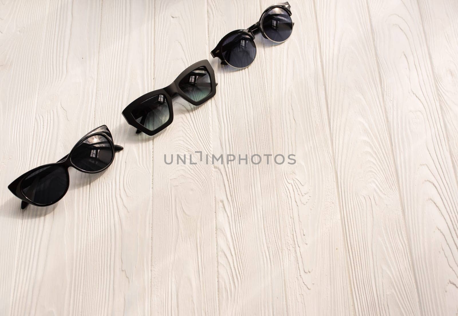 Stylish black sunglasses. Summer background mockup template text by AndriiDrachuk