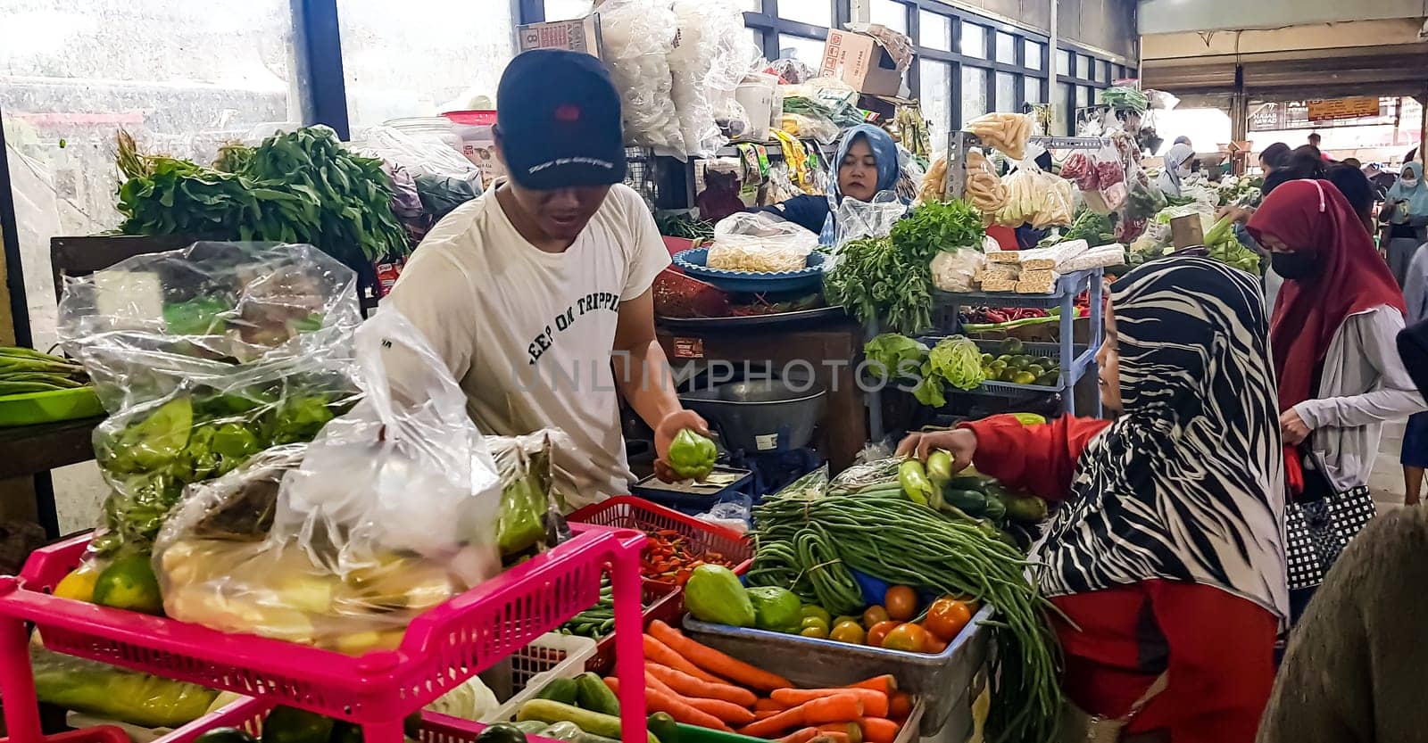 Surakarta, Central Java, Indonesia, 02 June 2023, Kadipolo Wet market Asian local people buy and sell their daily needs by antoksena