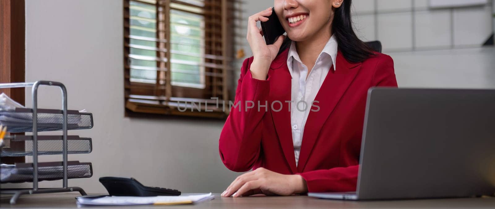 Happy business woman sitting and talking at work Job interview in front of laptop at home office by wichayada