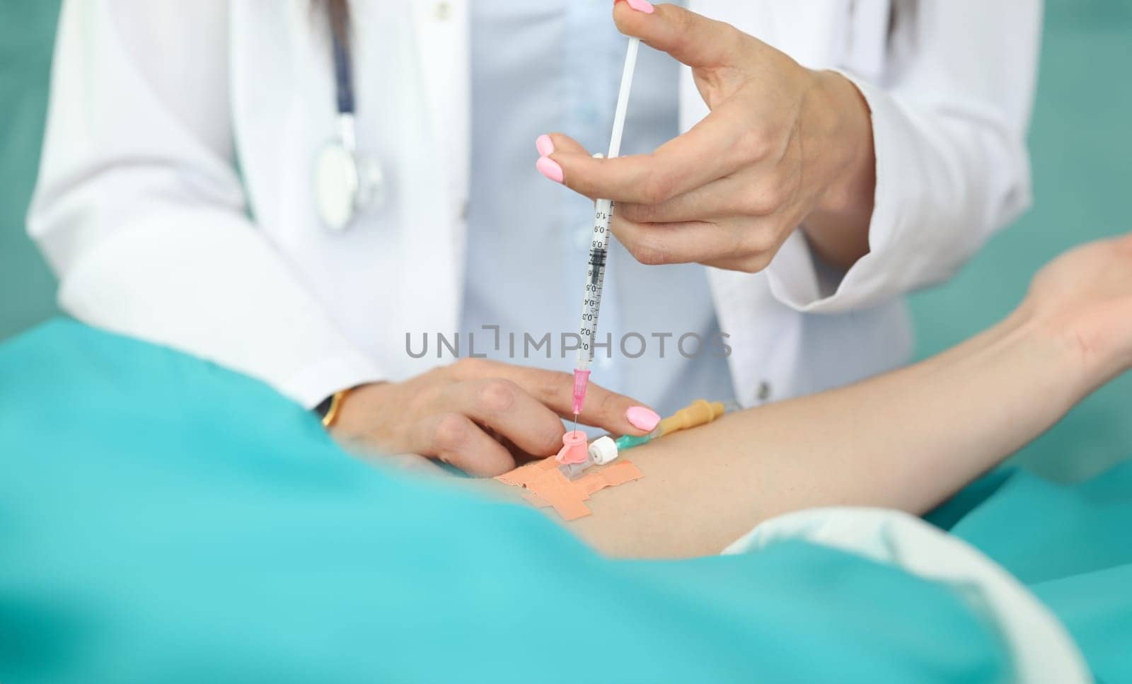 Nurse injects medicine into patients vein clinic. Diagnosis and treatment gastroenterological pathology. Form drug intolerance. Treatment and prevention ailments. Early diagnosis for quick cure