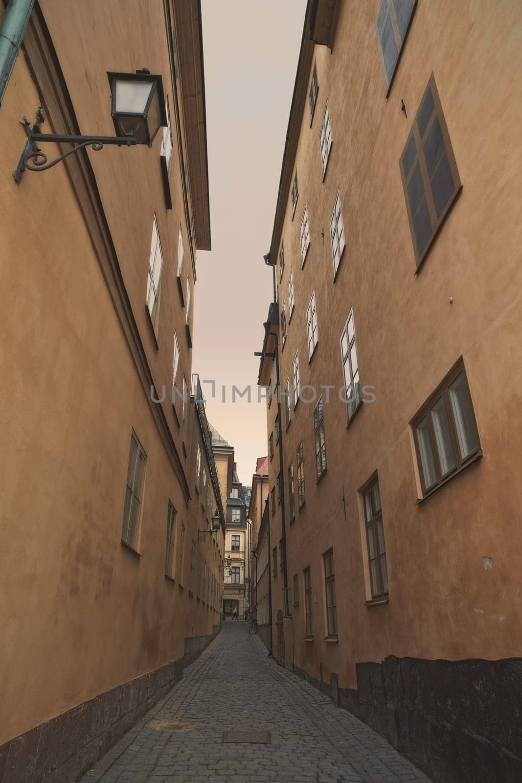 Travel, architecture and alley of vintage buildings in old town with history, culture and calm holiday destination. Vacation, landmark and quiet street in Sweden with retro apartment in ancient city