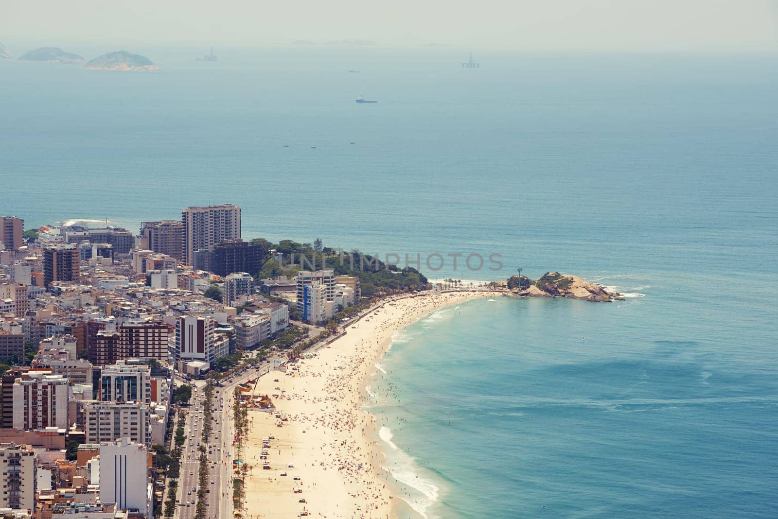 Drone, water and beach for travel, summer and freedom, location and adventure in nature. Aerial view, ocean or Rio de Janeiro landscape, island or tropical paradise, relax or stress relief in Brazil.