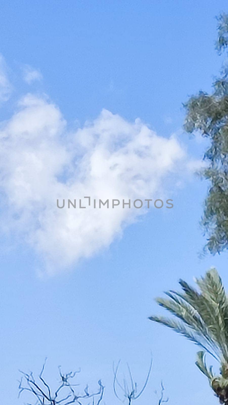 Blue light sky nature white clouds whether background . High quality photo