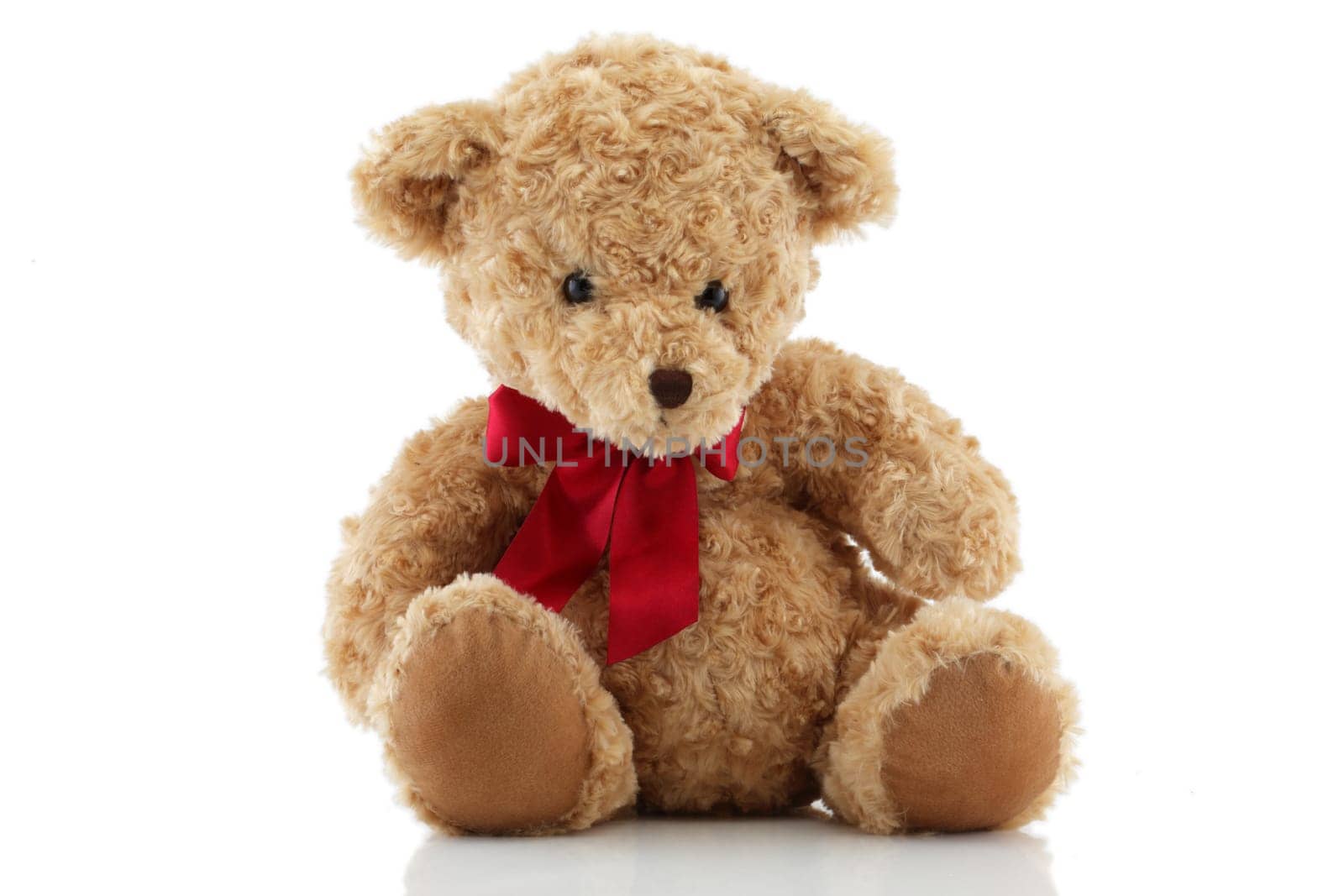 Brown Teddy Bear with red ribbon by VivacityImages