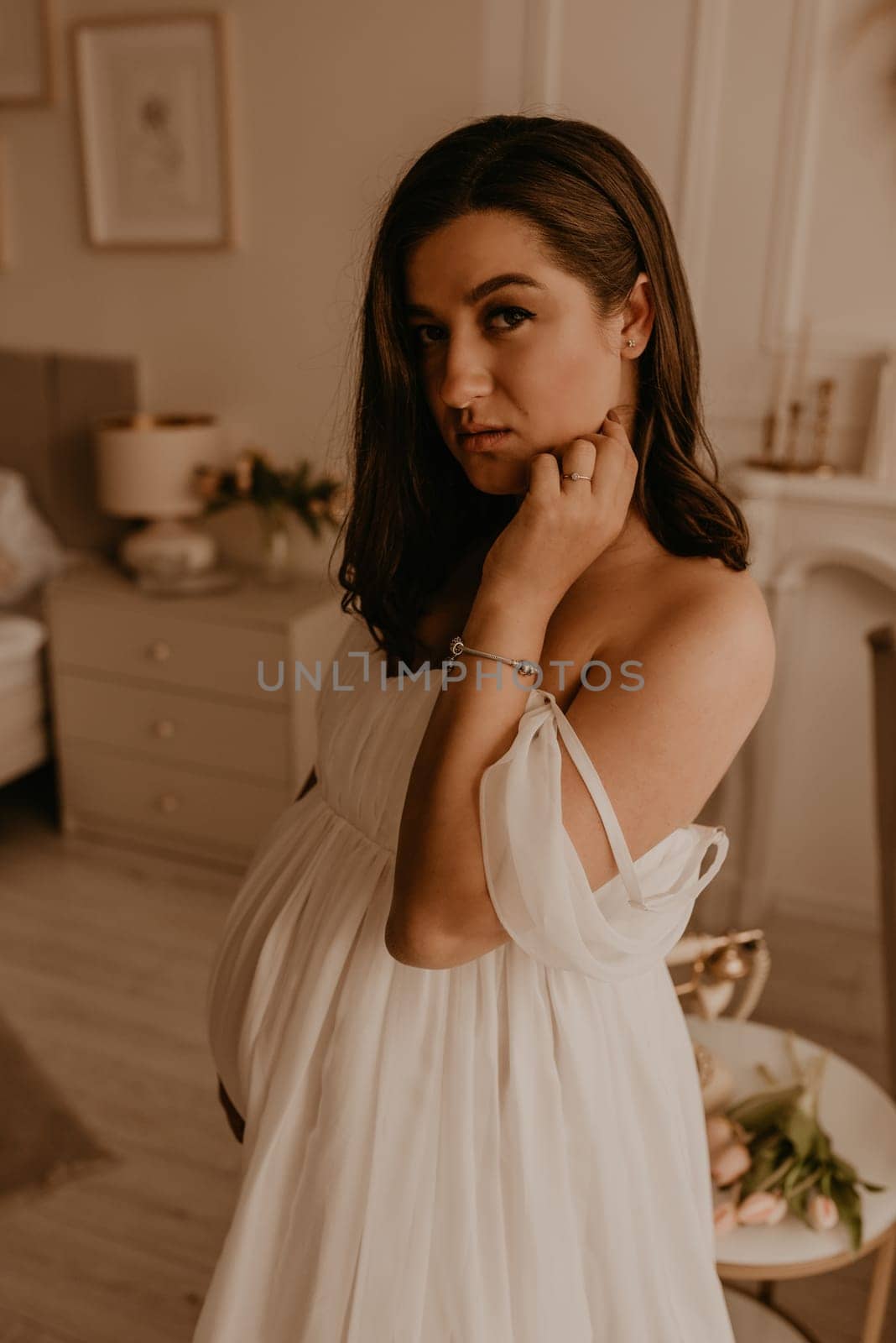 an incredibly beautiful married couple Expecting child, pregnant wife. Happy parenthood, real Ukrainian young family. romantic, gentle, stylish photo session of married couple. pregnant woman in love