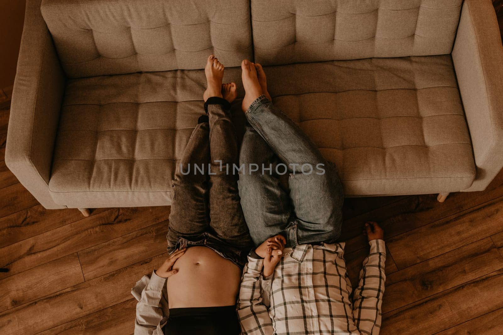 an incredibly beautiful married couple Expecting child, pregnant wife. Happy parenthood, real Ukrainian young family. romantic, gentle, stylish photo session of married couple. pregnant woman in love