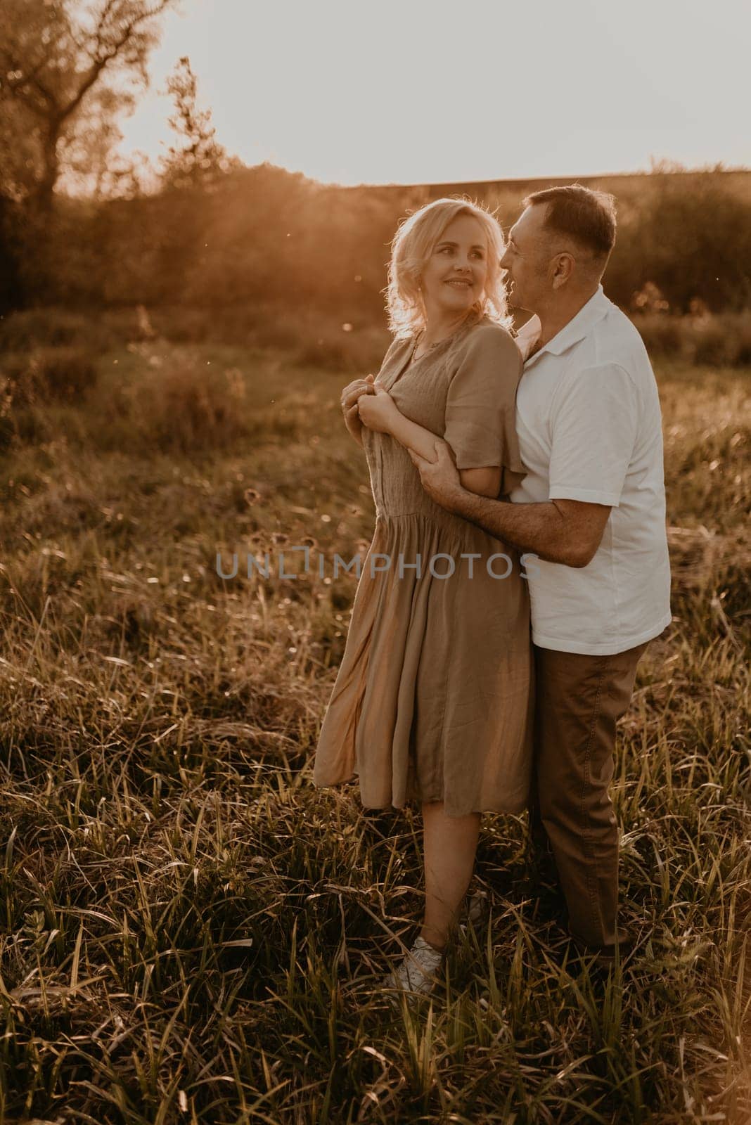 happy married couple mature people together for long time, secret of strong family relationships by AndriiDrachuk