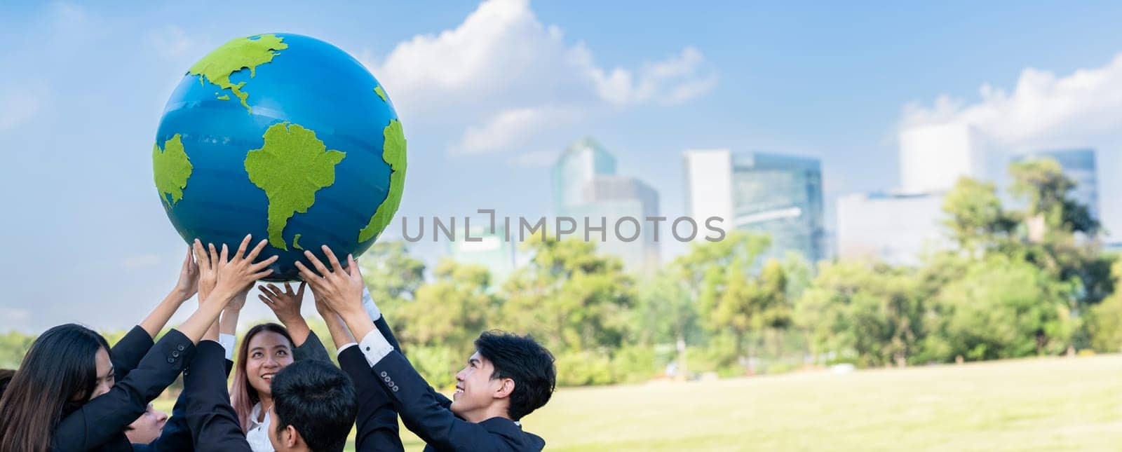Earth day concept with big Earth globe held by hand up in sky. Gyre by biancoblue