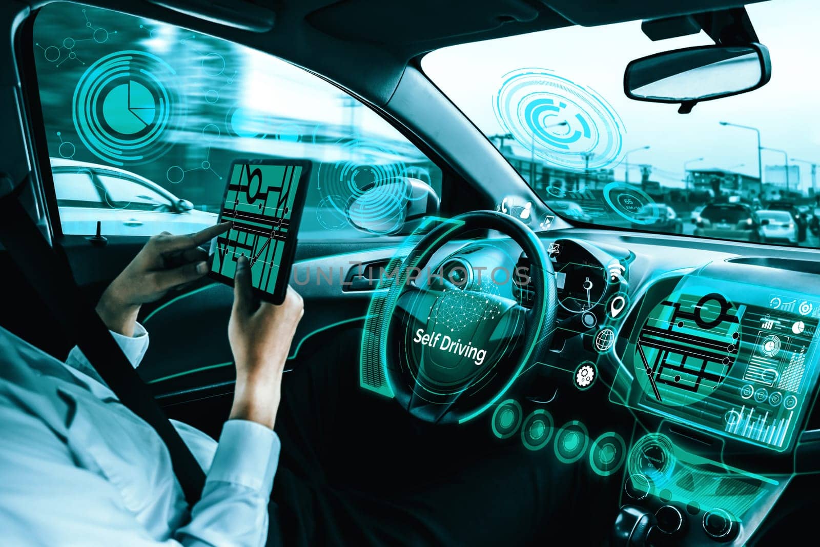 Self-driving autonomous car with relaxed young man sitting at driver seat is driving on busy highway road in the city. Concept of machine learning, artificial intelligence and augmented reality. uds