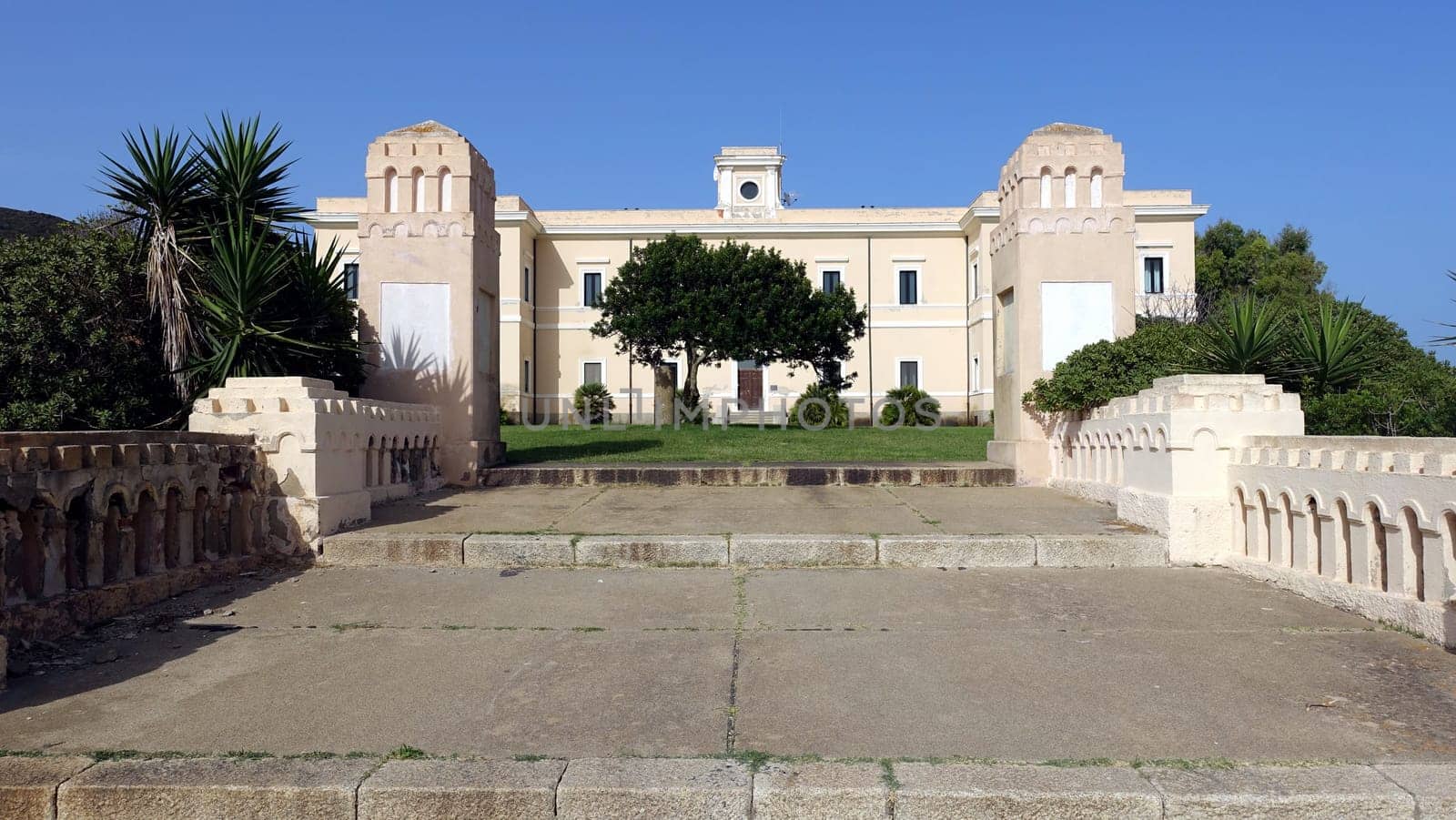 Asinara, Italy, August 11 2021. The main palace of Cala Reale. by Jamaladeen