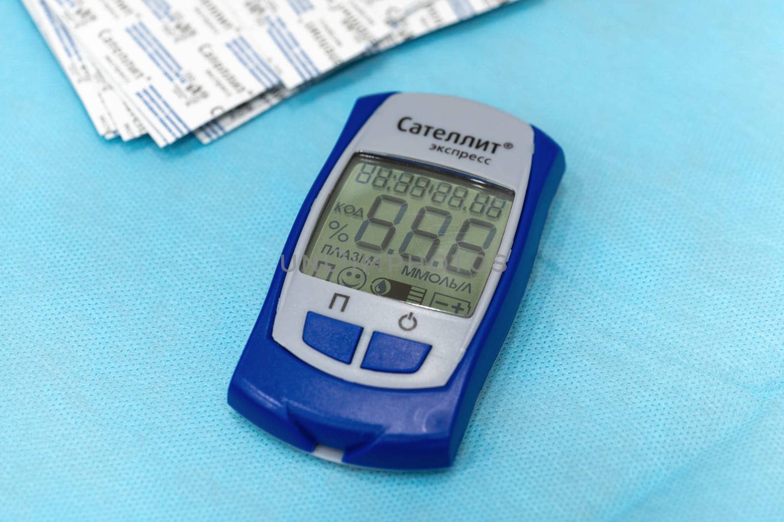 Medical device for quick test, sugar diabetes monitoring, measuring checking blood sugar in diabetes mellitus - Russian Glucometer Satellite Express. Kamchatka, Russia - October 17, 2019