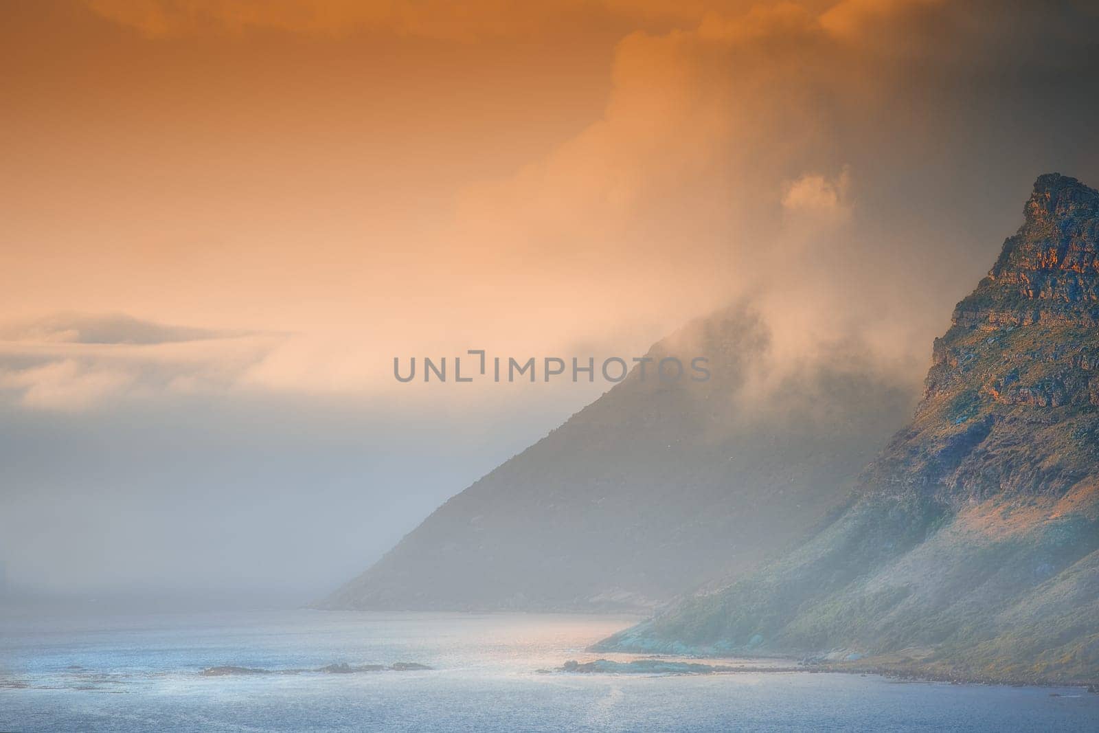 Mountain, island and ocean with sunset sky, clouds and natural landscape at travel location. Nature, ecology and sustainable environment with earth, sea and tropical holiday destination with color