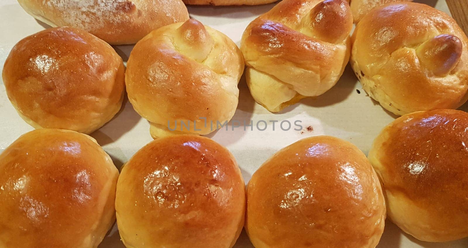 Fresh Baked soft bread rolls and hard bread rolls. Warm Fresh Buttery Rolls. good for your multimedia content background and restaurant menu