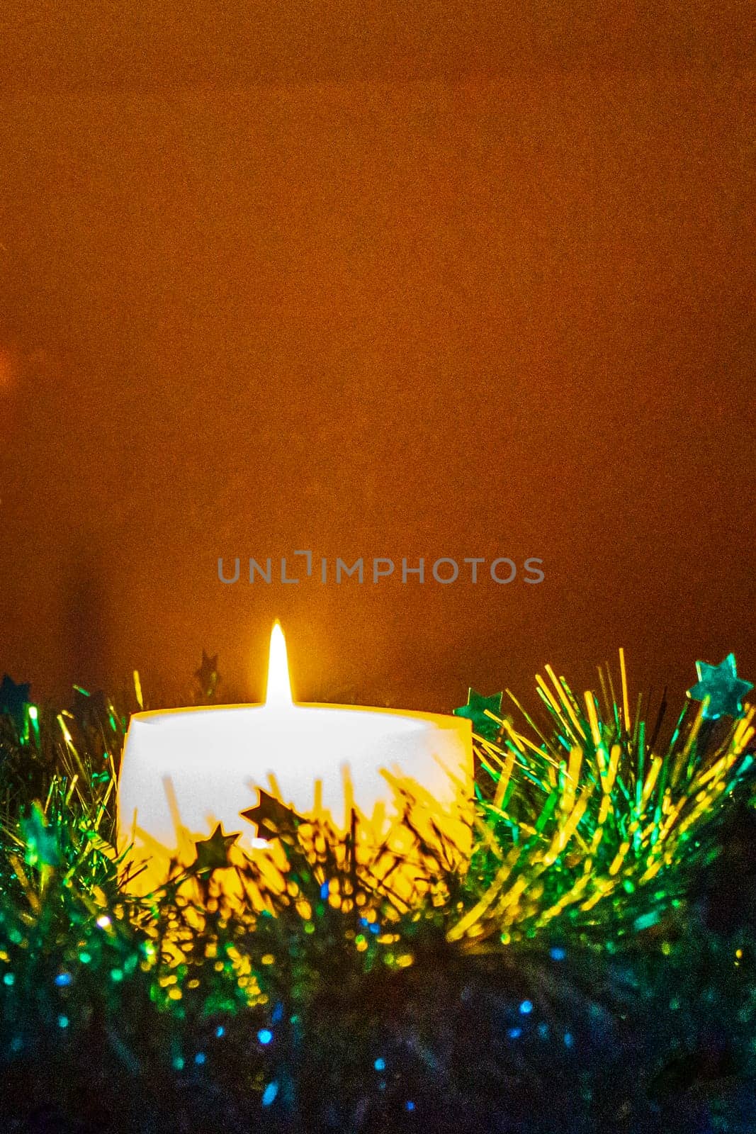 Christmas candle advent with green decoration in Germany. by Arkadij
