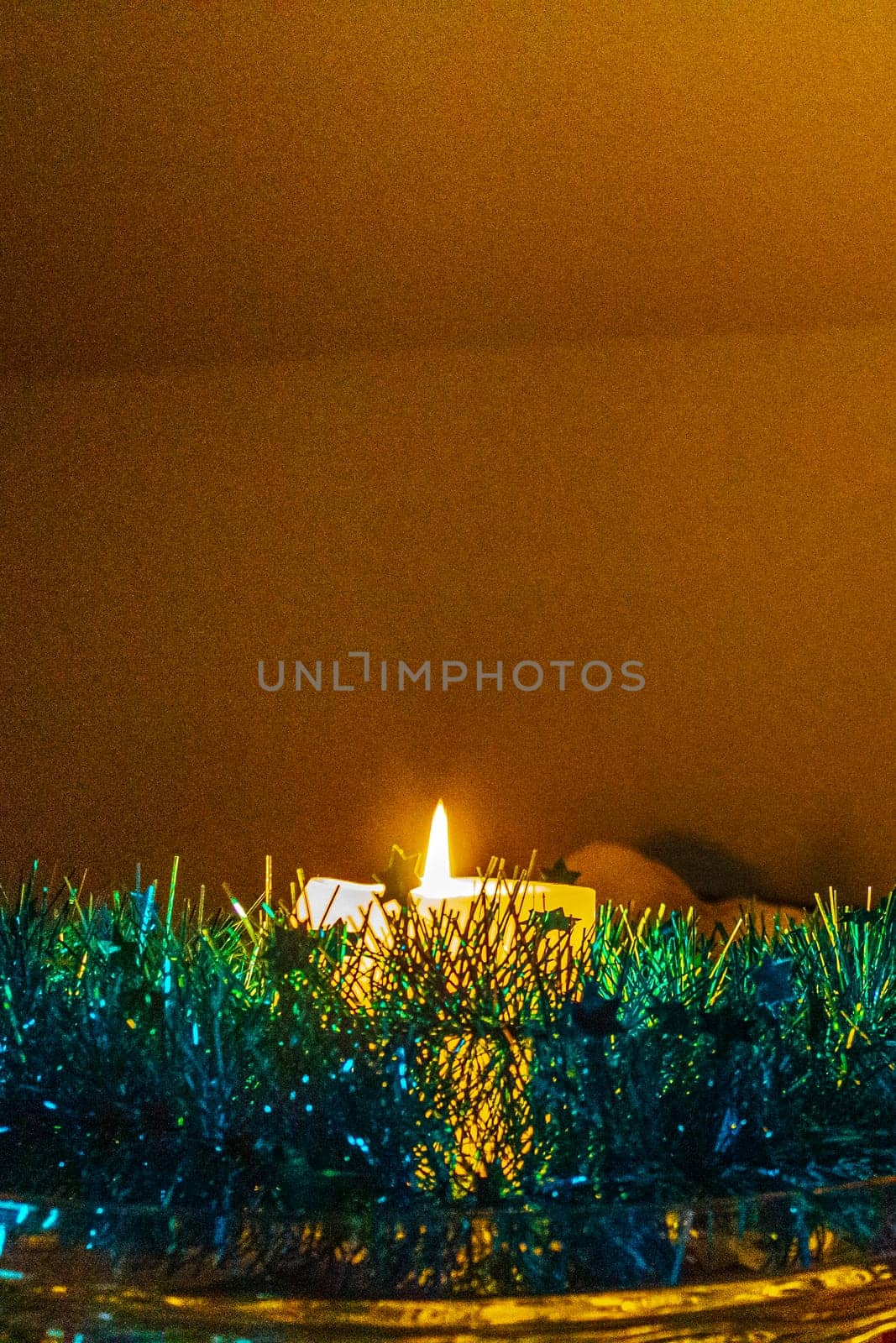 Christmas candle advent with green decoration in Germany. by Arkadij