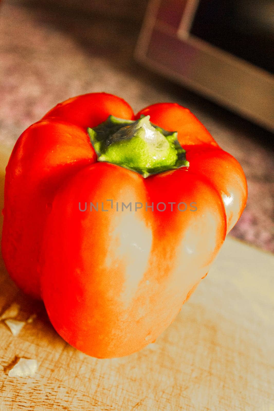 Cooking with red peppers whole and sliced in Germany. by Arkadij