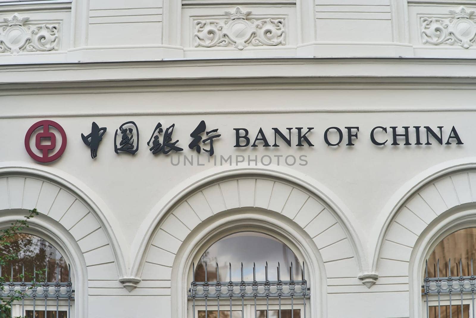 The Bank of China is a prominent fixture on the facade of a building, showcasing stunning architecture and a distinctive font on the exterior wall