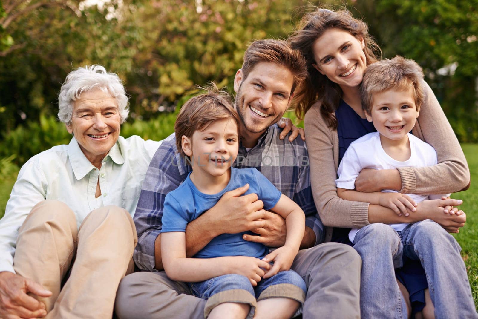 Family, outdoor and portrait for holiday, vacation and backyard with children and smile with love. Mom, dad and grandma with kids, nature and trees for memories, elderly and joy together in bonding.