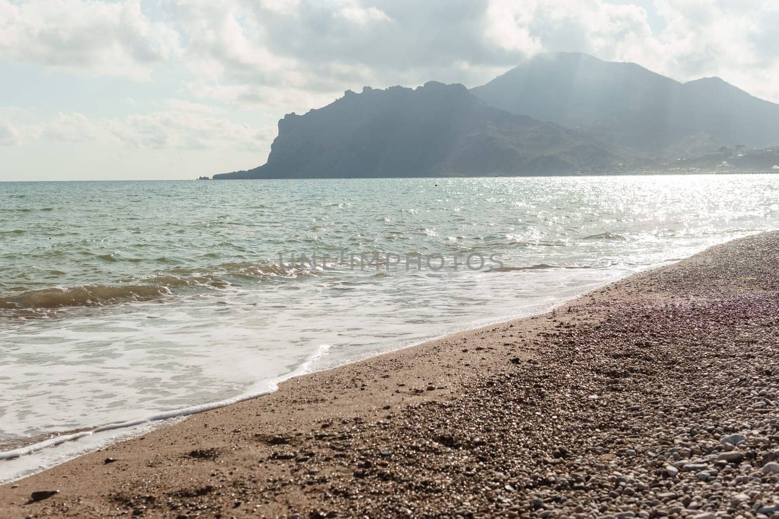 Beach Relaxation at the Black Sea. Fairy-tale Moments of a Sunny Day. The concept of tourism and sea travel.