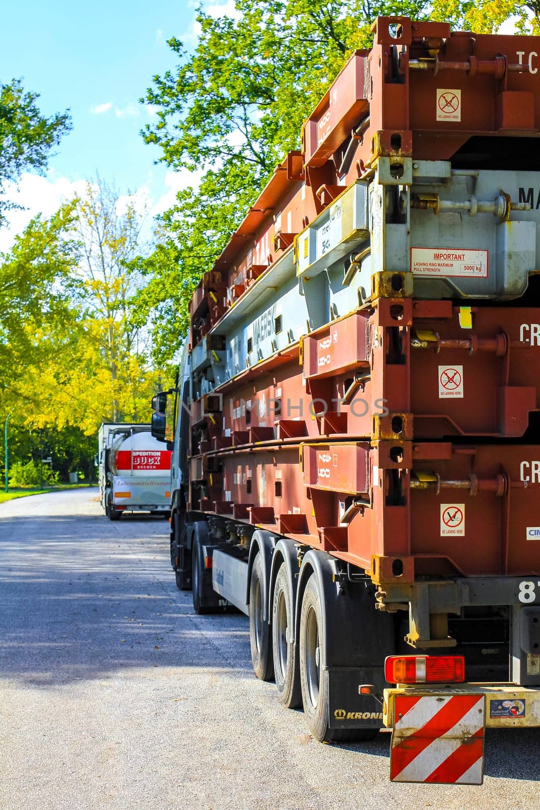 Truck with trailer parked outside in Germany. by Arkadij