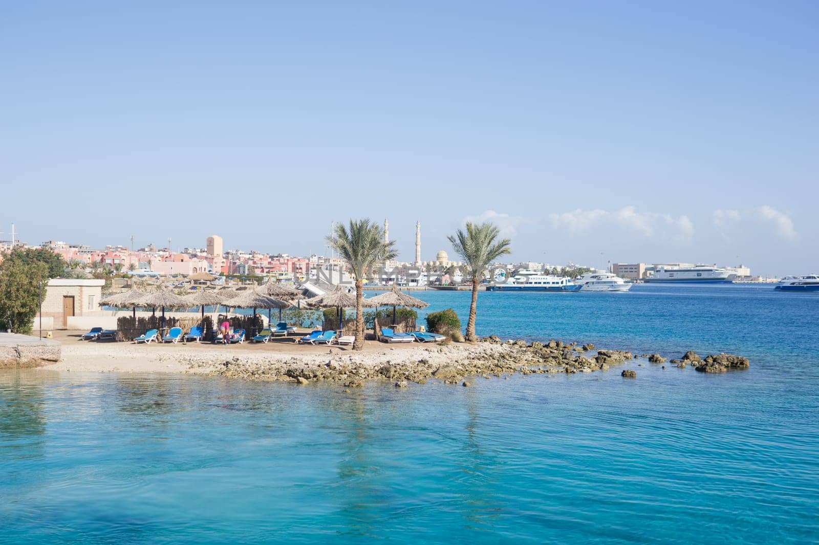 Beach Relaxation at the Red Sea. Fairy-tale Moments of a Sunny Day. The concept of tourism and sea travel by Annu1tochka