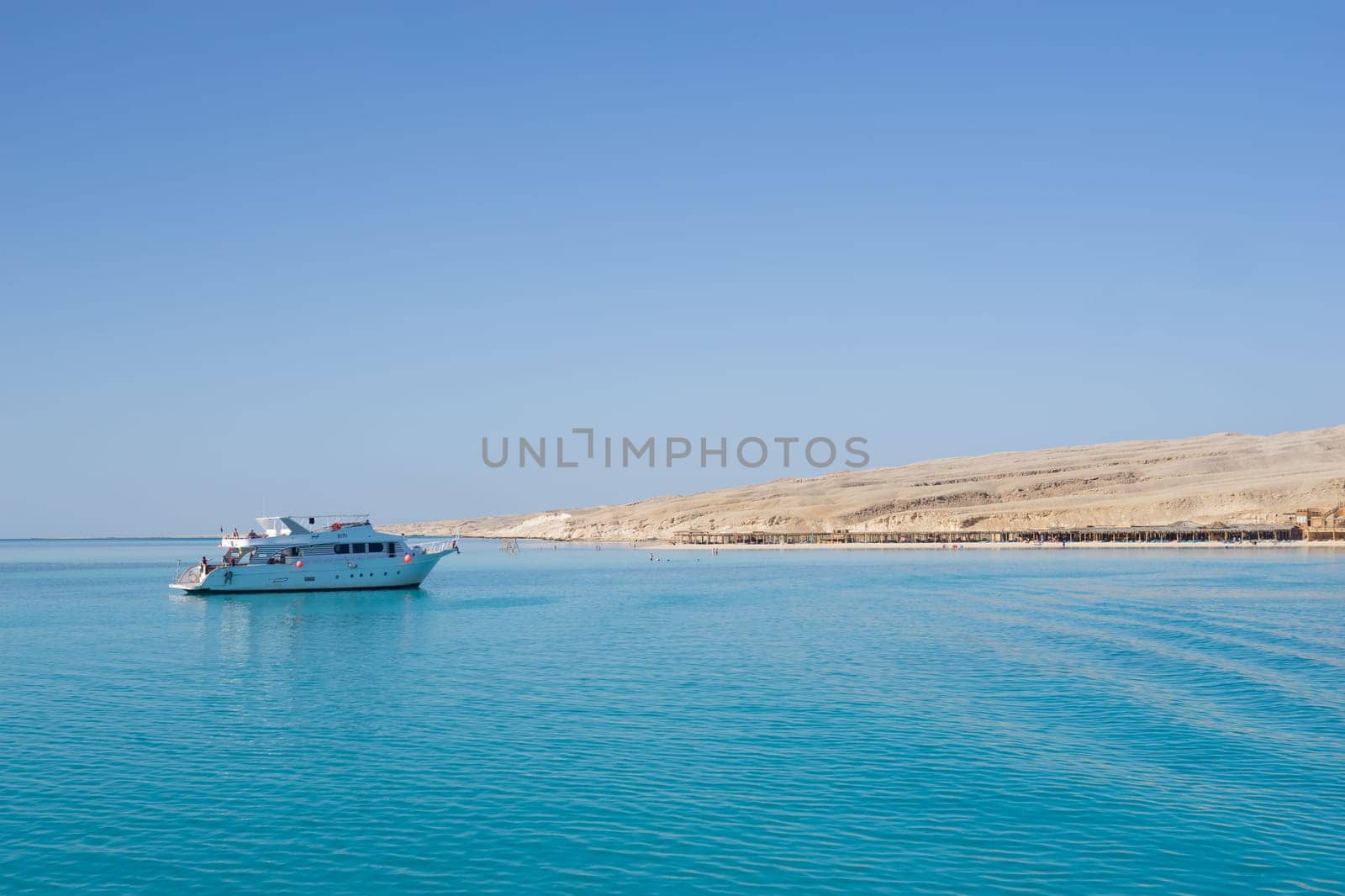 Beach Relaxation at the Red Sea. Fairy-tale Moments of a Sunny Day. The concept of tourism and sea travel.