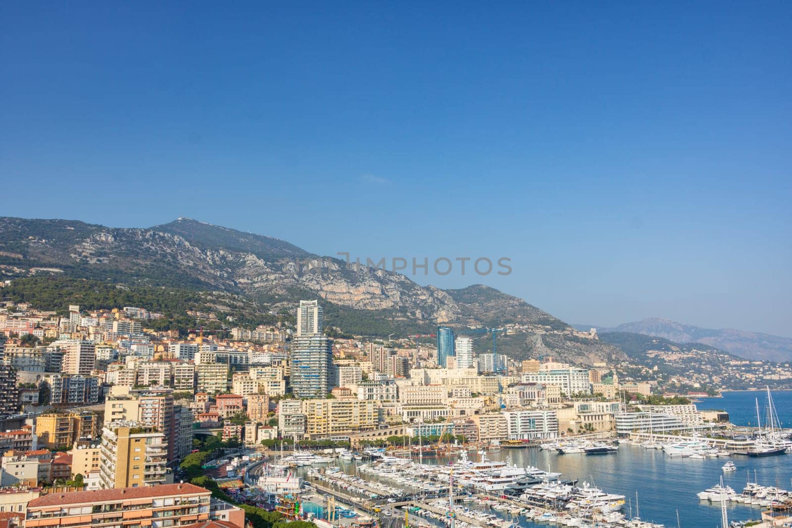 Panoramic view of Monte Carlo marina and cityscape by vladispas