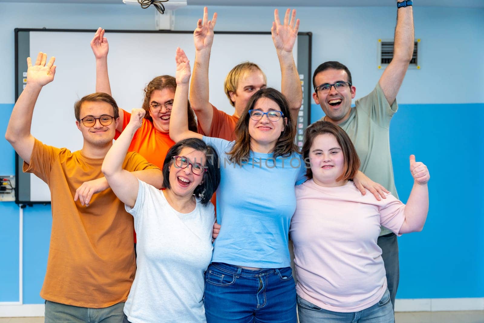 Happy people with special needs posing after gymnastic class by Huizi