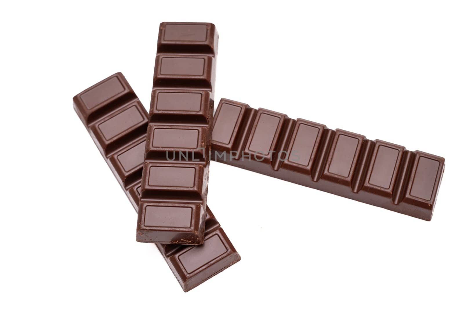 Three dark chocolate bars isolate on a white background.