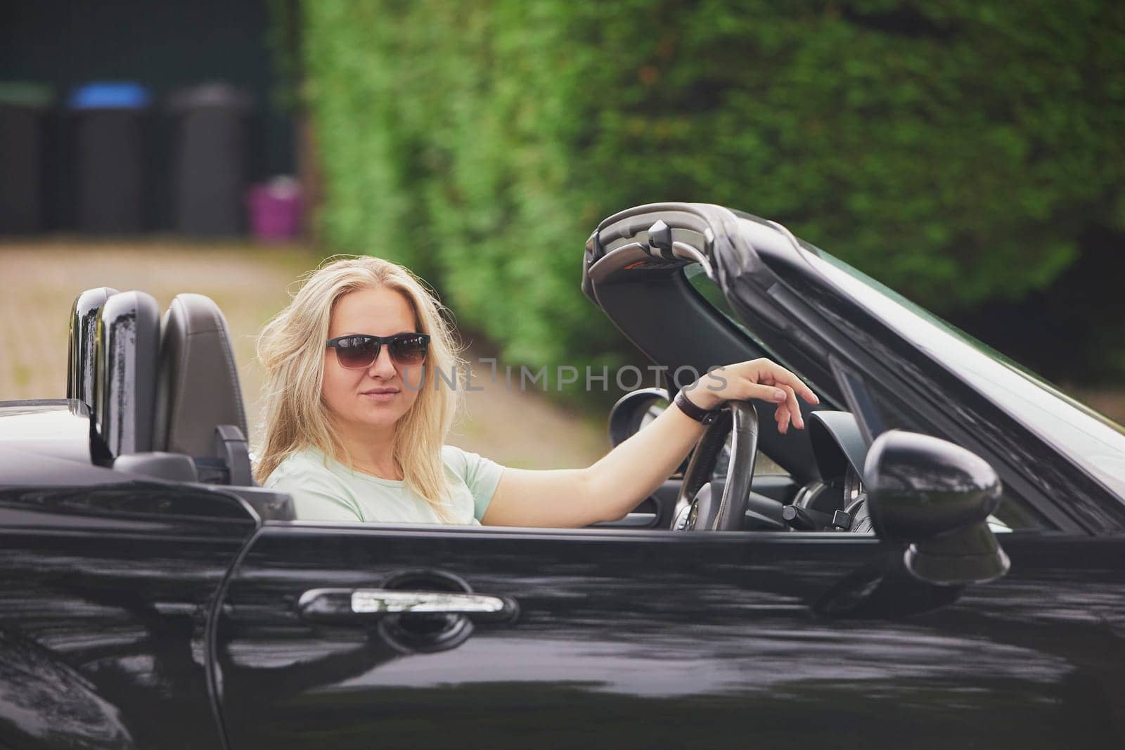 Attractive woman in a cabriolet in the Netherlands by Viktor_Osypenko