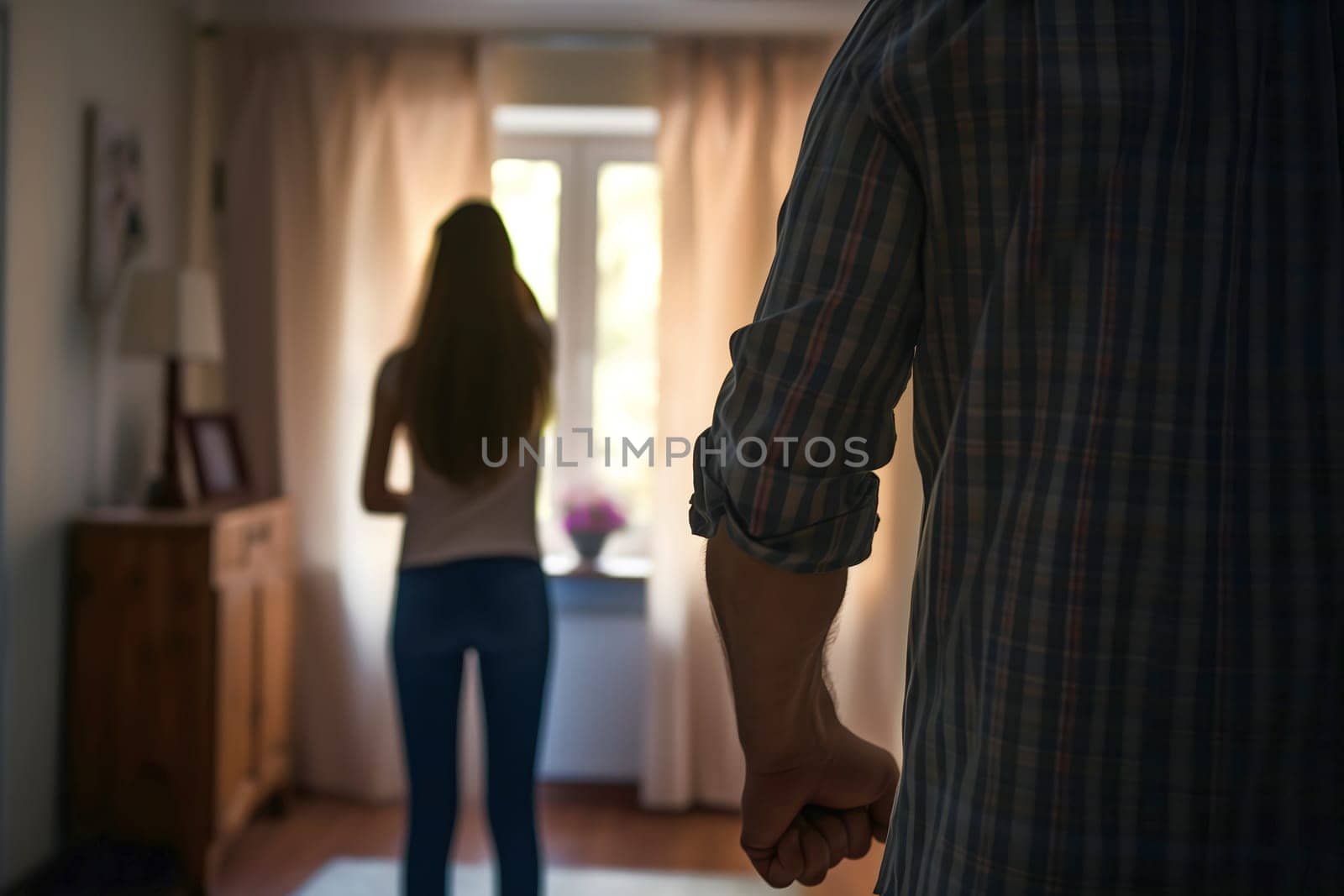 domestic violence, man holding in front of a woman, view from the back, girl in the background by z1b