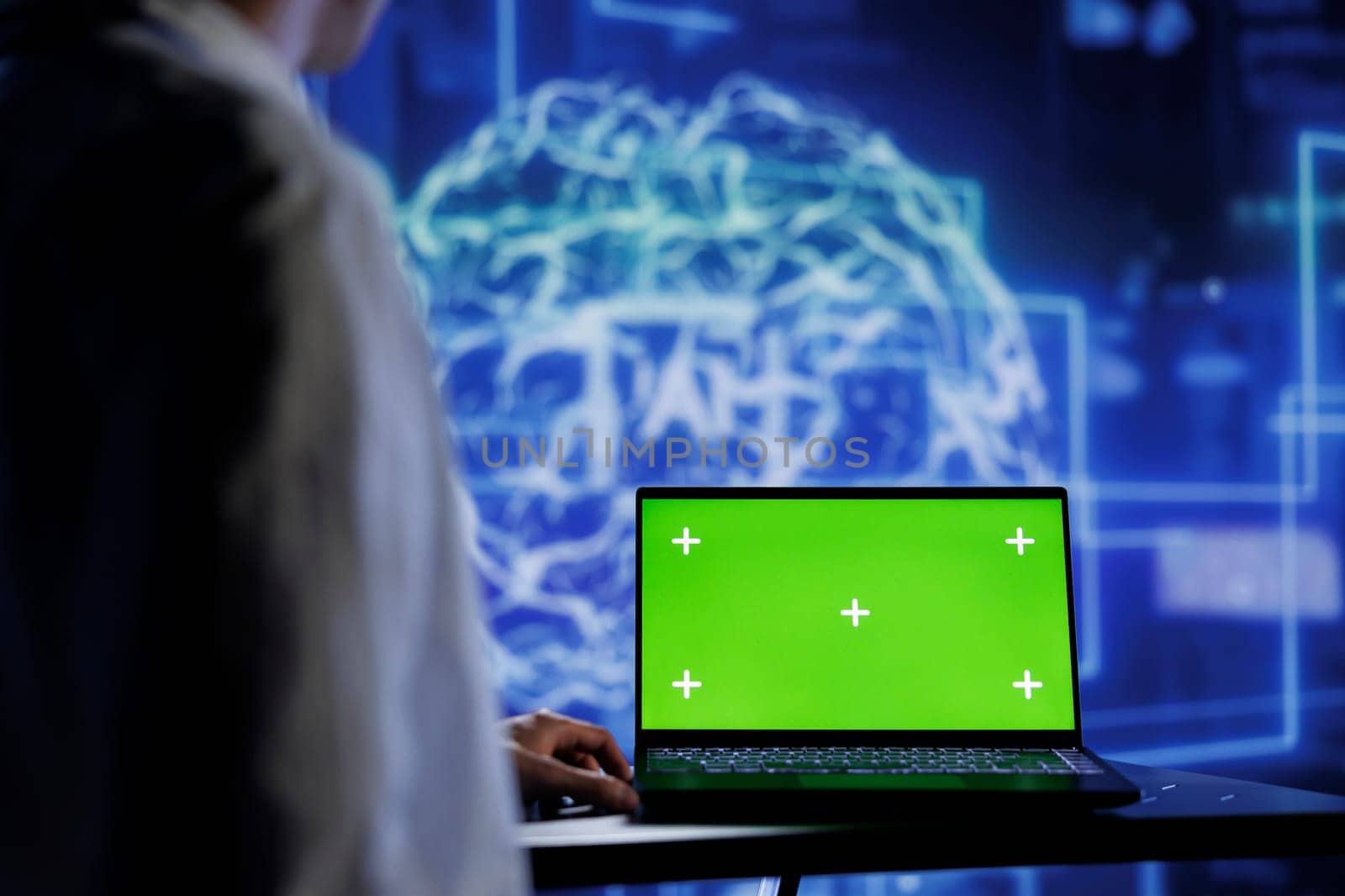 Admin using mockup device for artificial intelligence computing simulating human brain through self learning algorithms. Employee with isolated screen laptop, working with AI deep neural networks